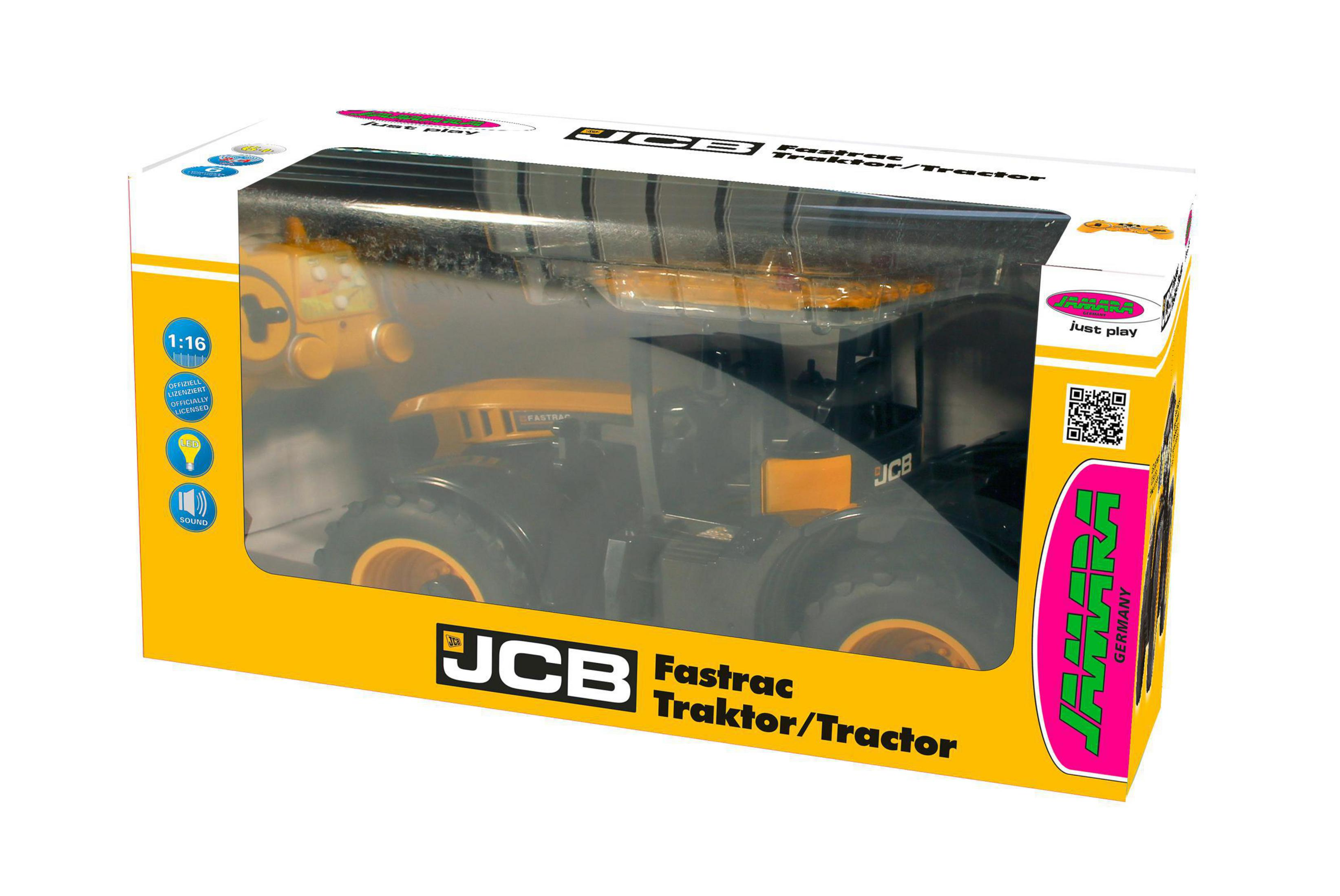 Ein Spielzeugtraktor in einer Box, mit einem Fenster, das den Traktor zeigt.