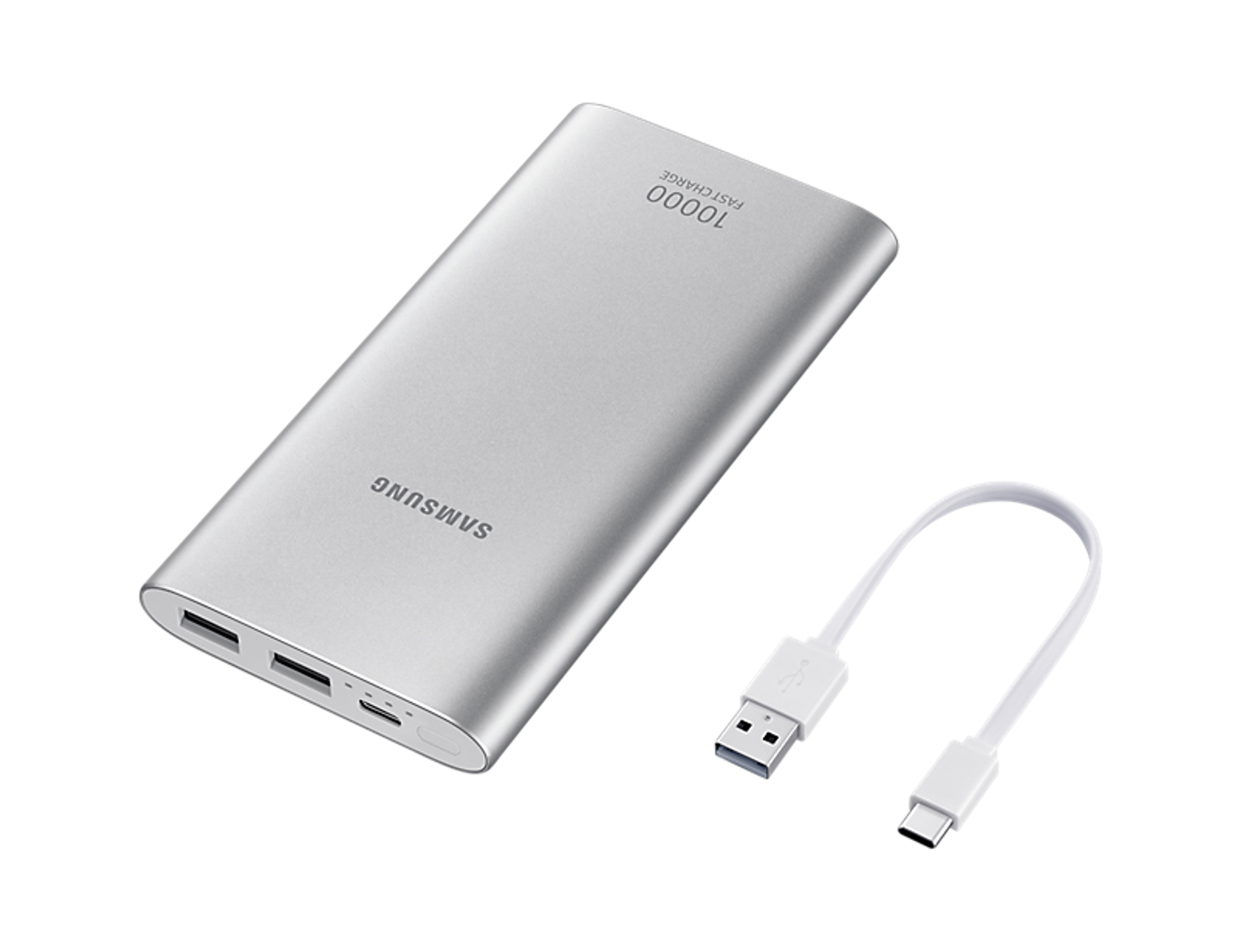 Une batterie externe Samsung argentée avec un câble de chargement blanc à côté. Il est écrit 10000 CHARGE RAPIDE.