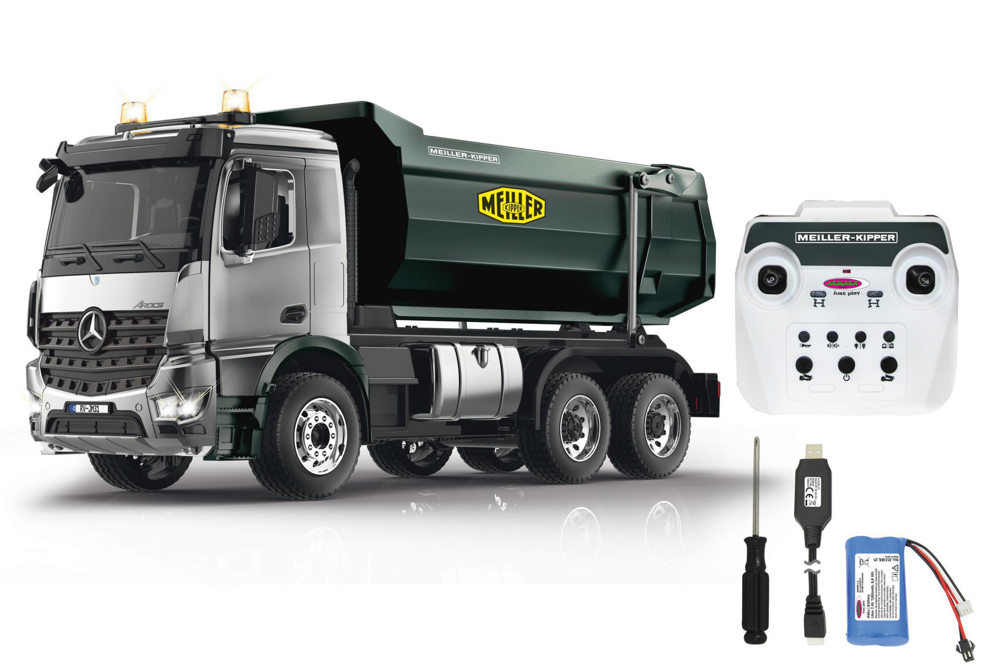 Ein großer silberner LKW mit Kippmulde. Eine Fernbedienung, ein Schraubendreher und eine Batterie sind ebenfalls vorhanden.