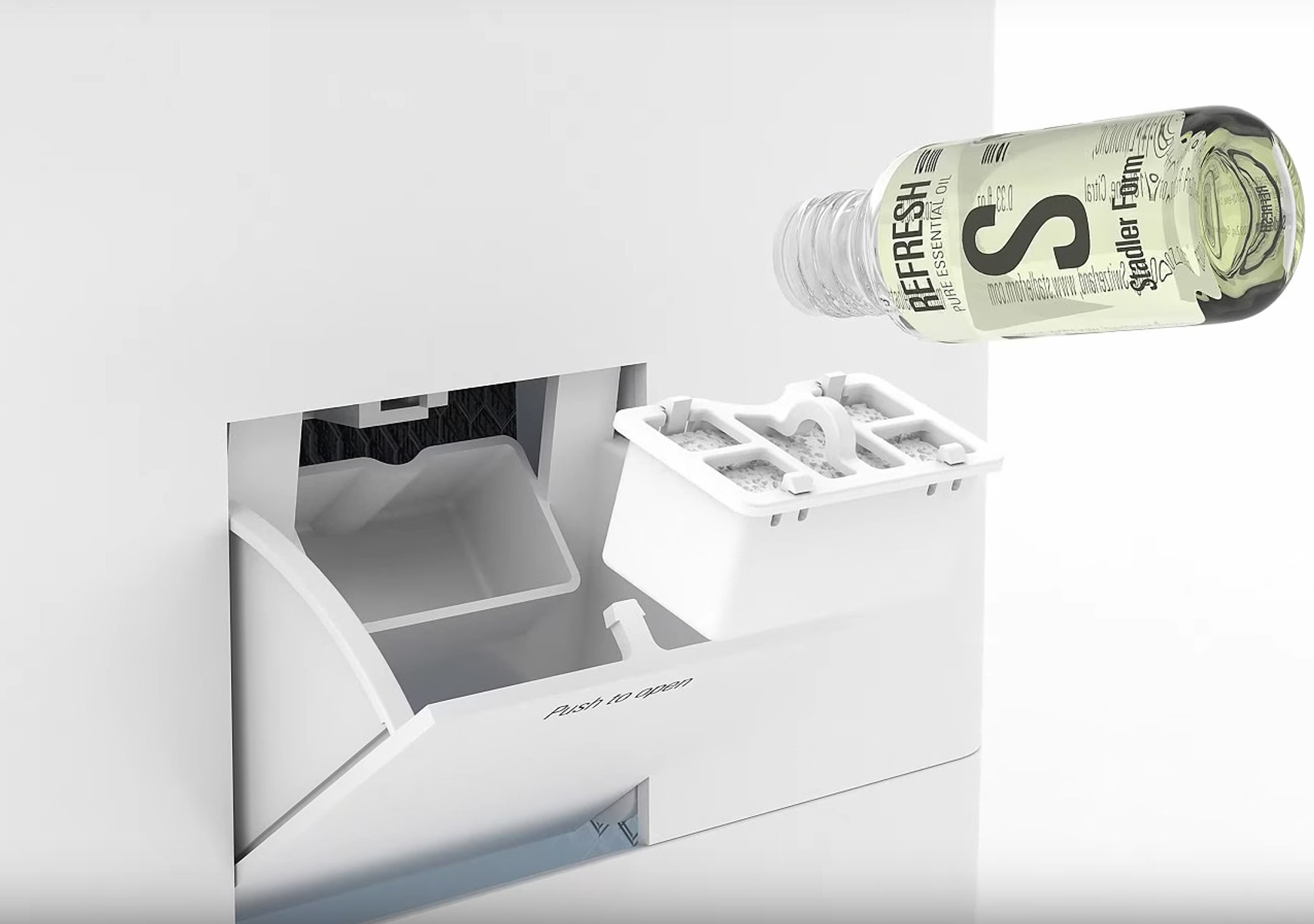 A white appliance with a bottle of essential oil next to it.