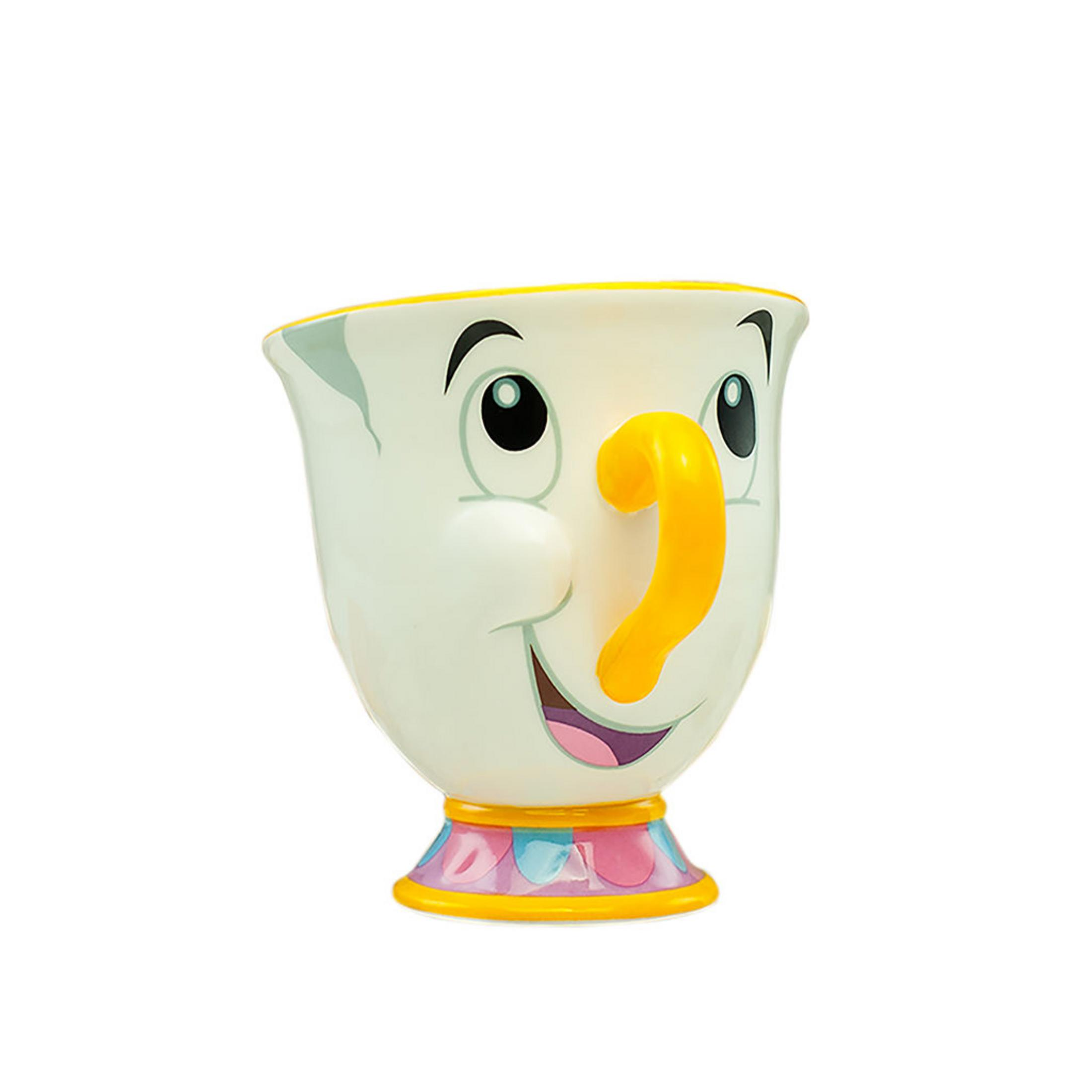 Weißer Chip-Becher mit gelbem Griff. Hat ein lächelndes Gesicht. Die Basis ist rosa und blau.