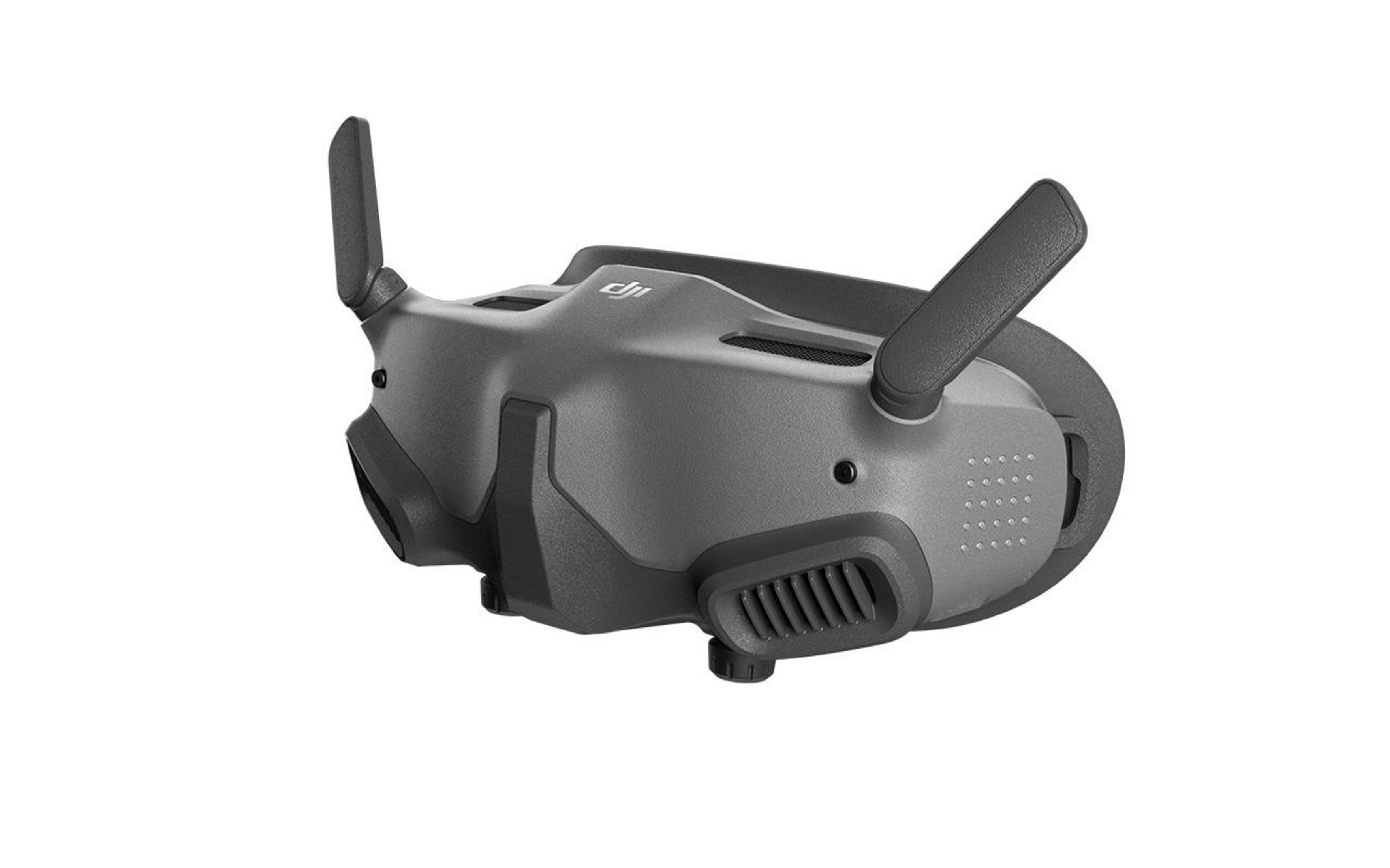 DJI FPV-Brille, dunkelgrau, zwei Antennen, Seitenansicht, isoliert auf weißem Hintergrund.
