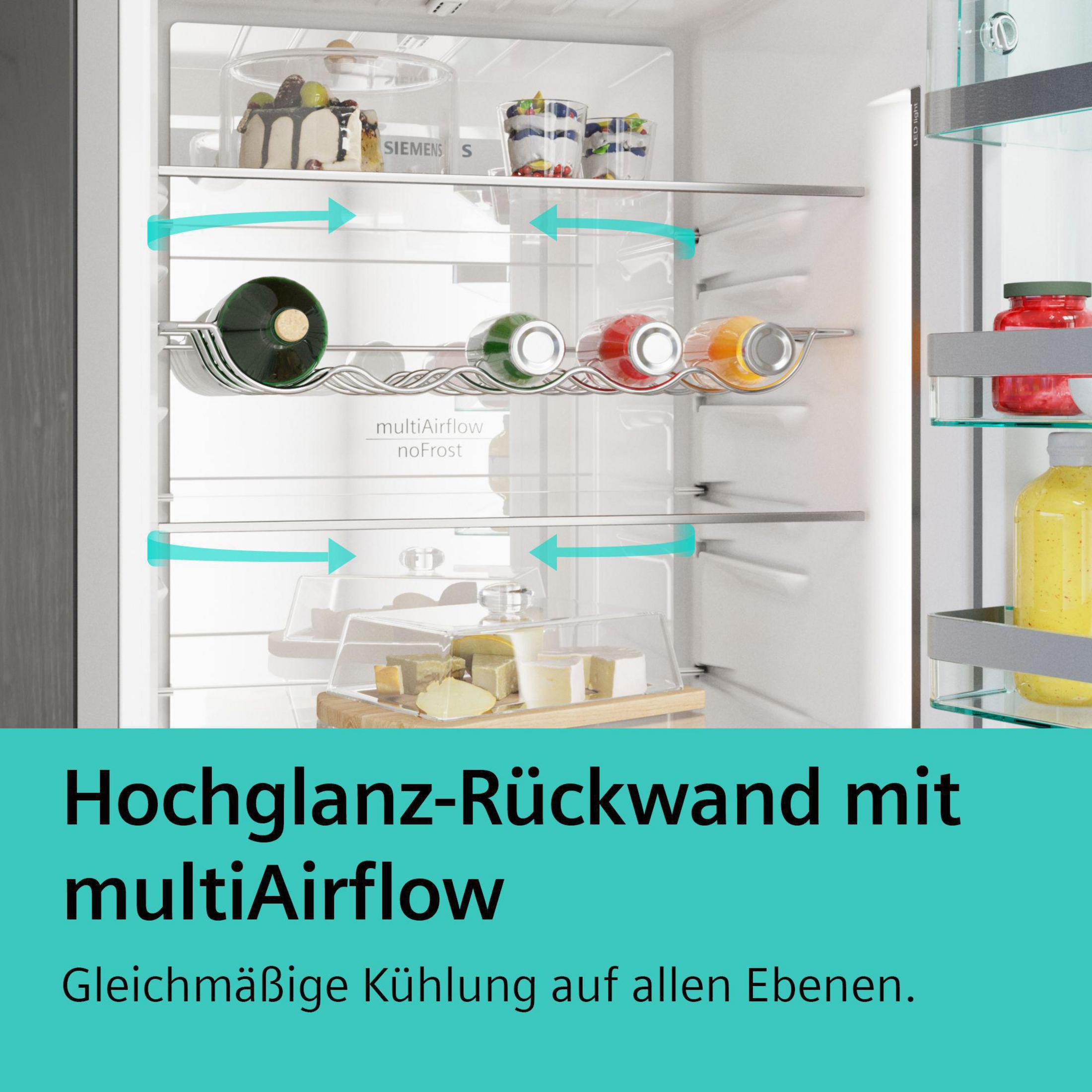 Offener Kühlschrankinnenraum mit Regalen voller Speisen und Getränke; Pfeile zeigen Luftstrom.