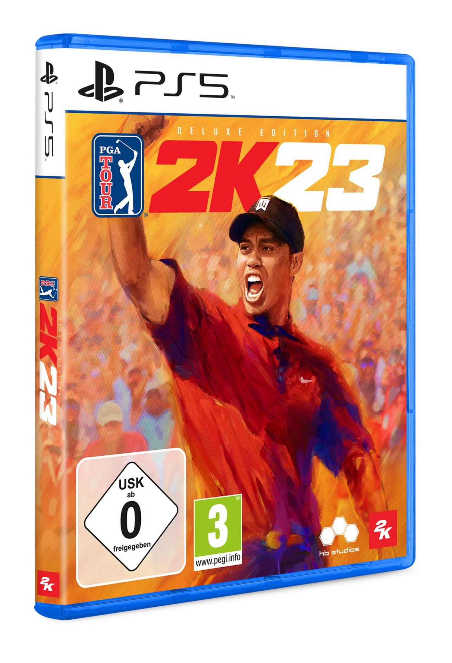 Eine PS5-Spielbox, PGA Tour 2K23, mit Tiger Woods auf dem Cover, in einem blauen Gehäuse.