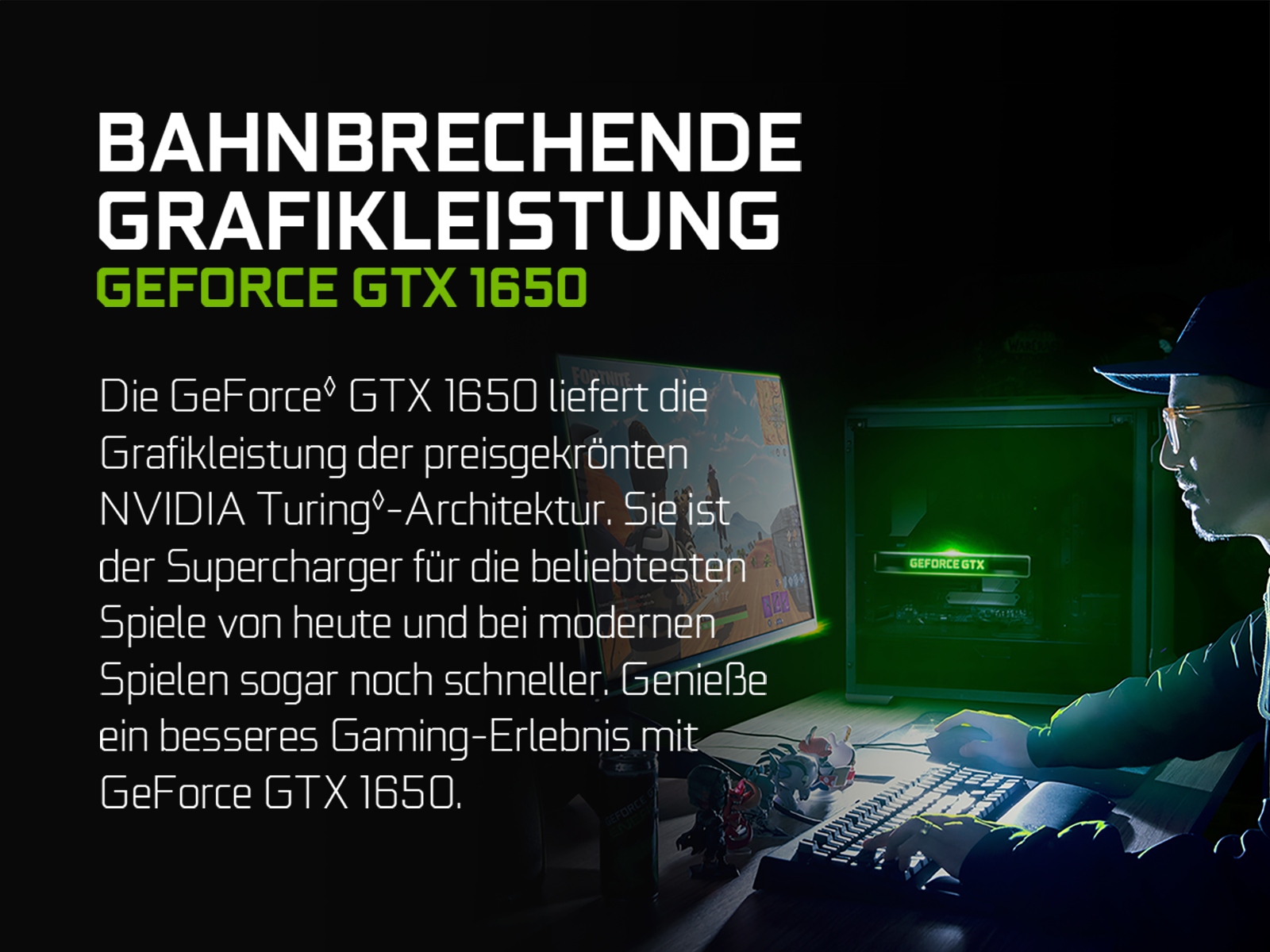 Mann spielt mit Computer-Setup; Text 'GeForce GTX 1650' sichtbar.