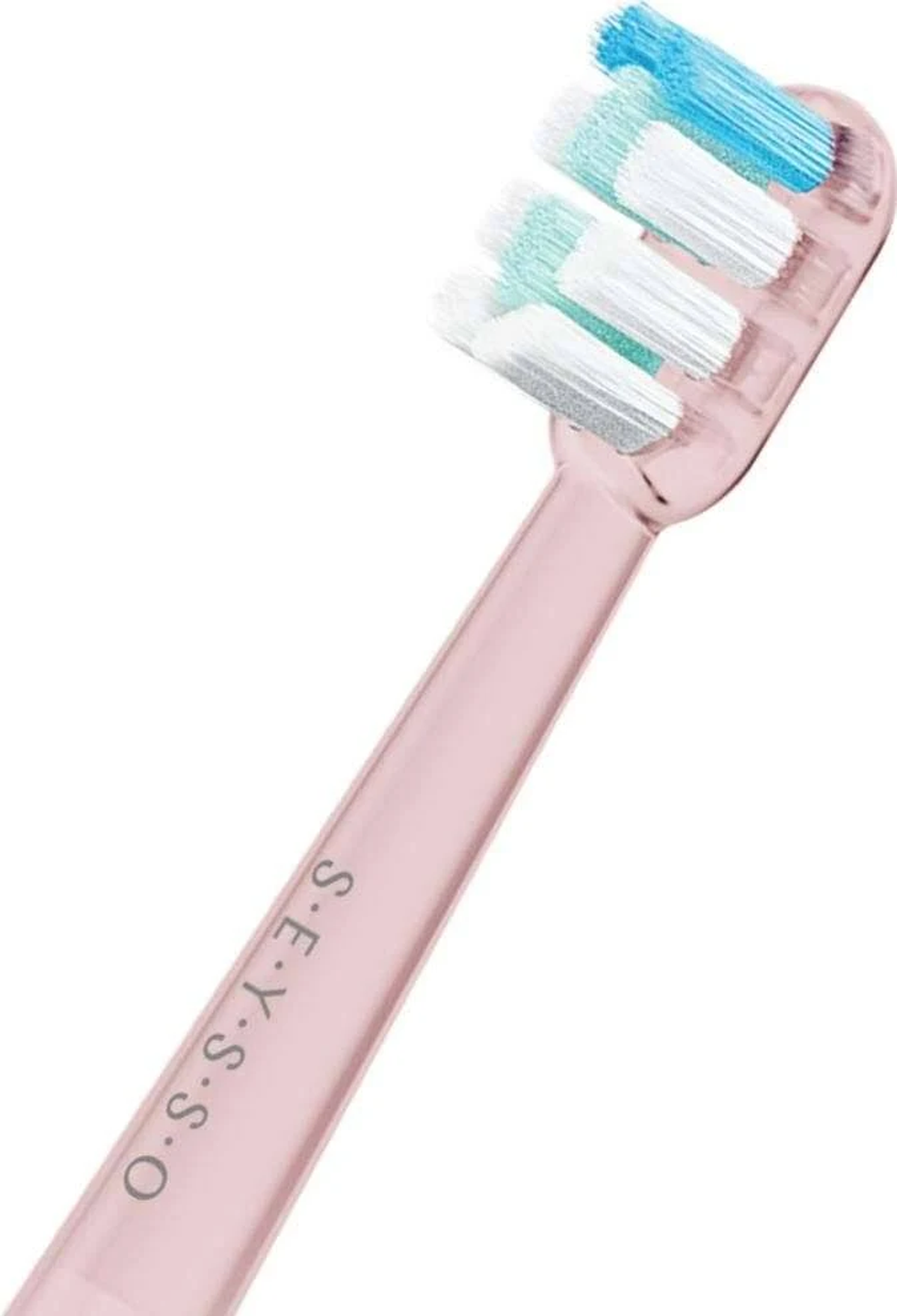 Primo piano della testina di uno spazzolino elettrico con manico rosa e setole multicolore.