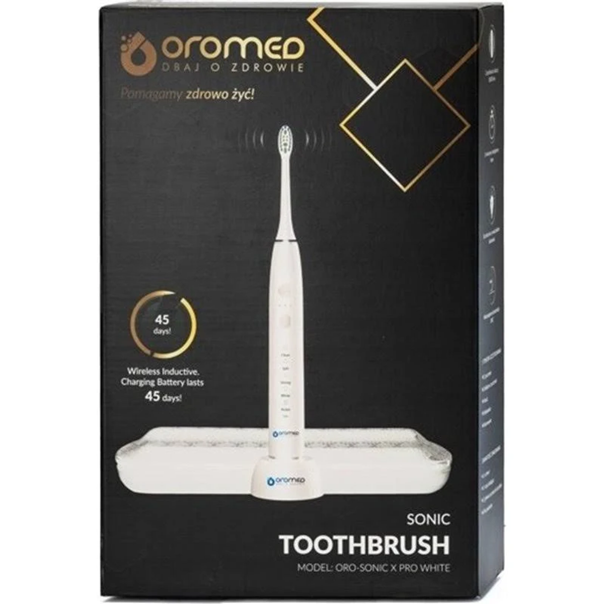 Cepillo de dientes eléctrico blanco en caja con base de carga, fondo negro.