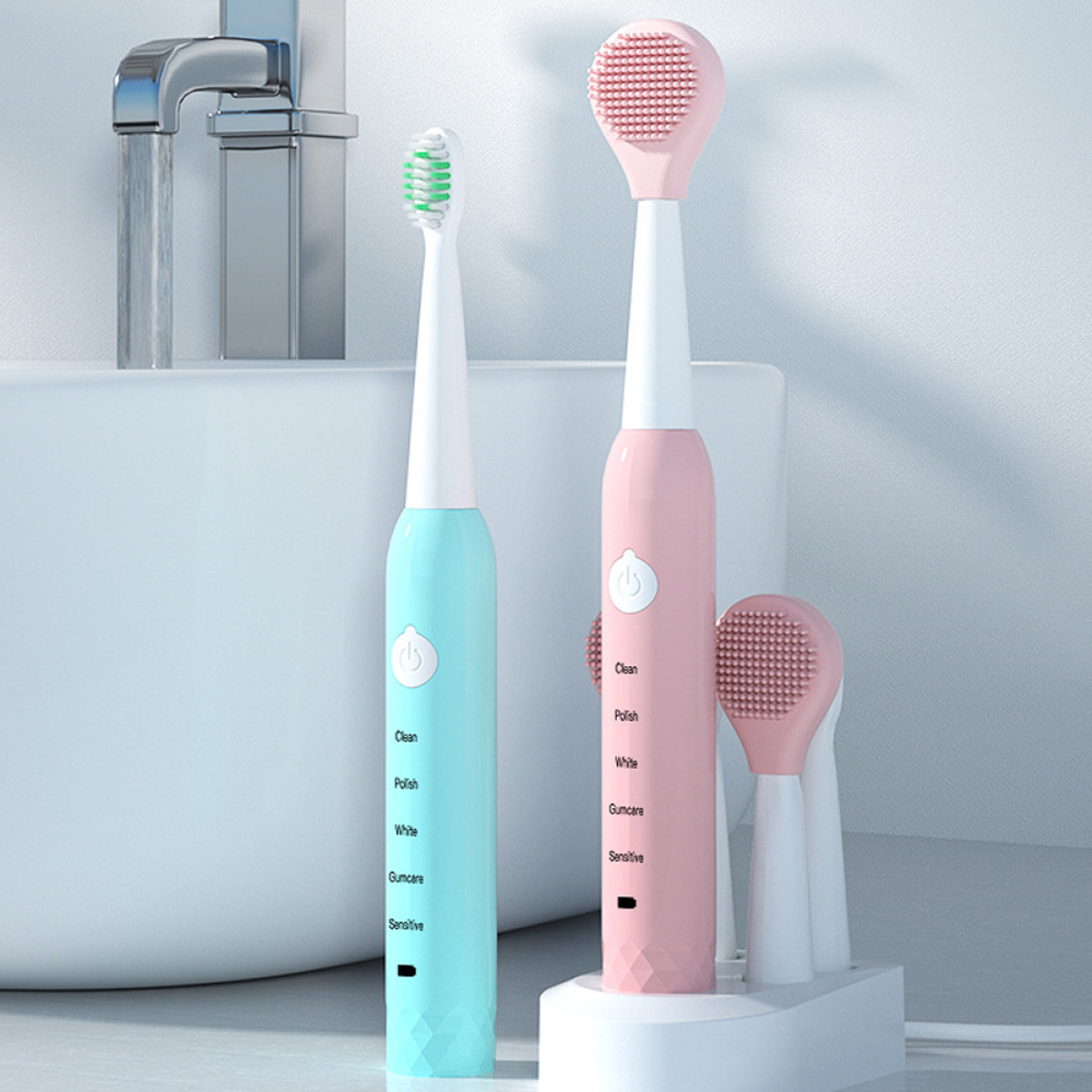 Zwei elektrische Zahnbürsten und eine Ladestation. Eine blau, eine rosa.