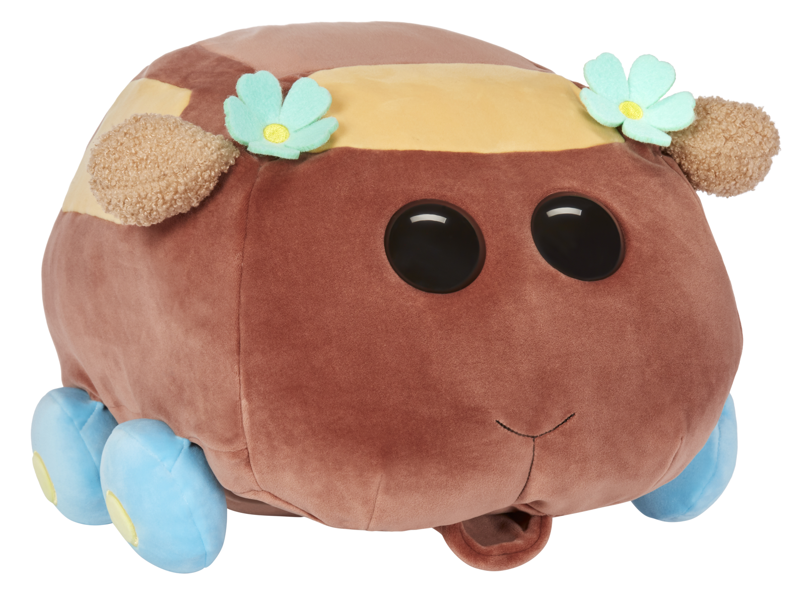 Une voiture en peluche marron avec des décorations florales et de grands yeux noirs.