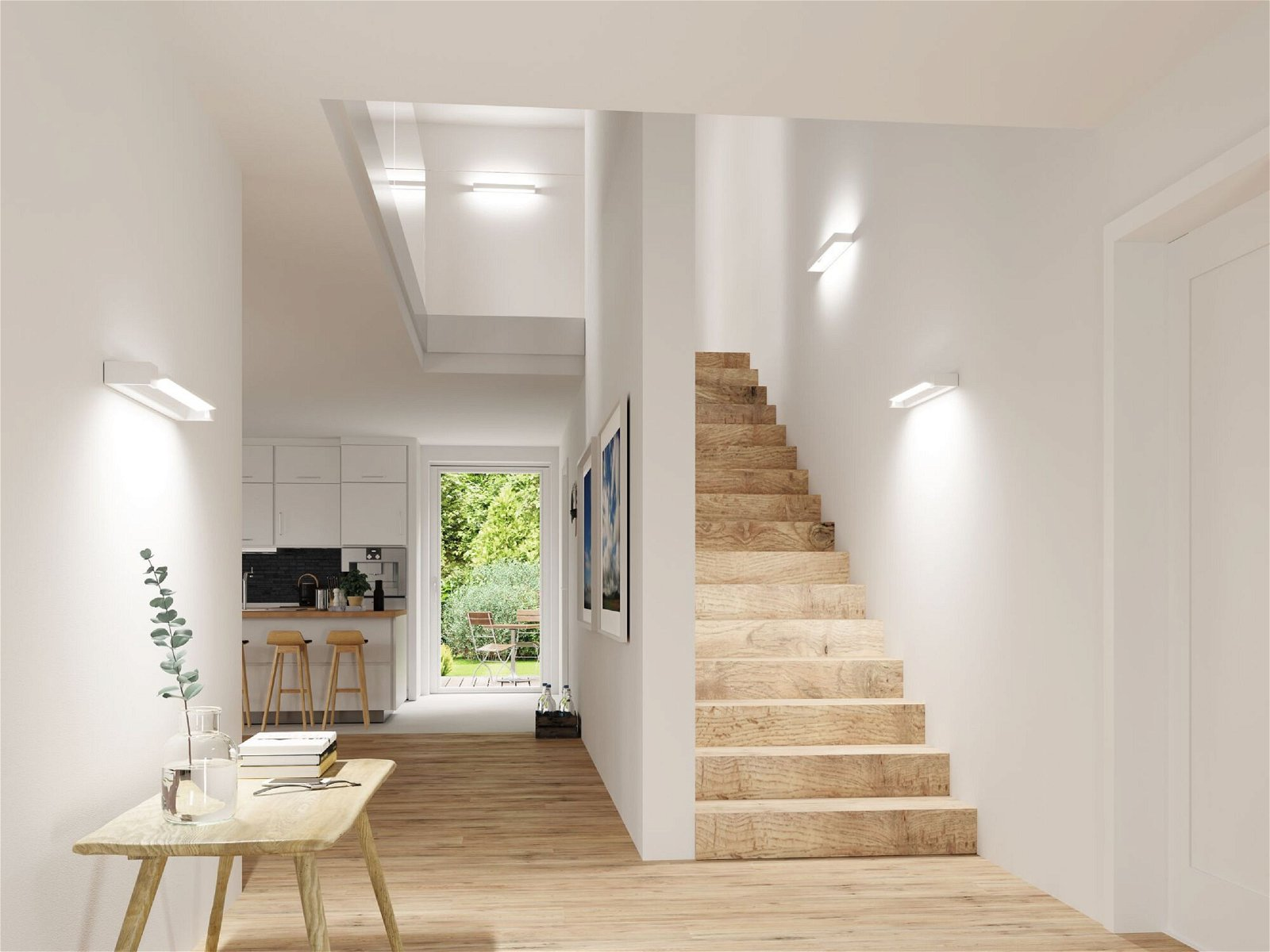 Nowoczesny korytarz z drewnianą podłogą i schodami. Białe ściany i oświetlenie. Widok na otwarte drzwi.