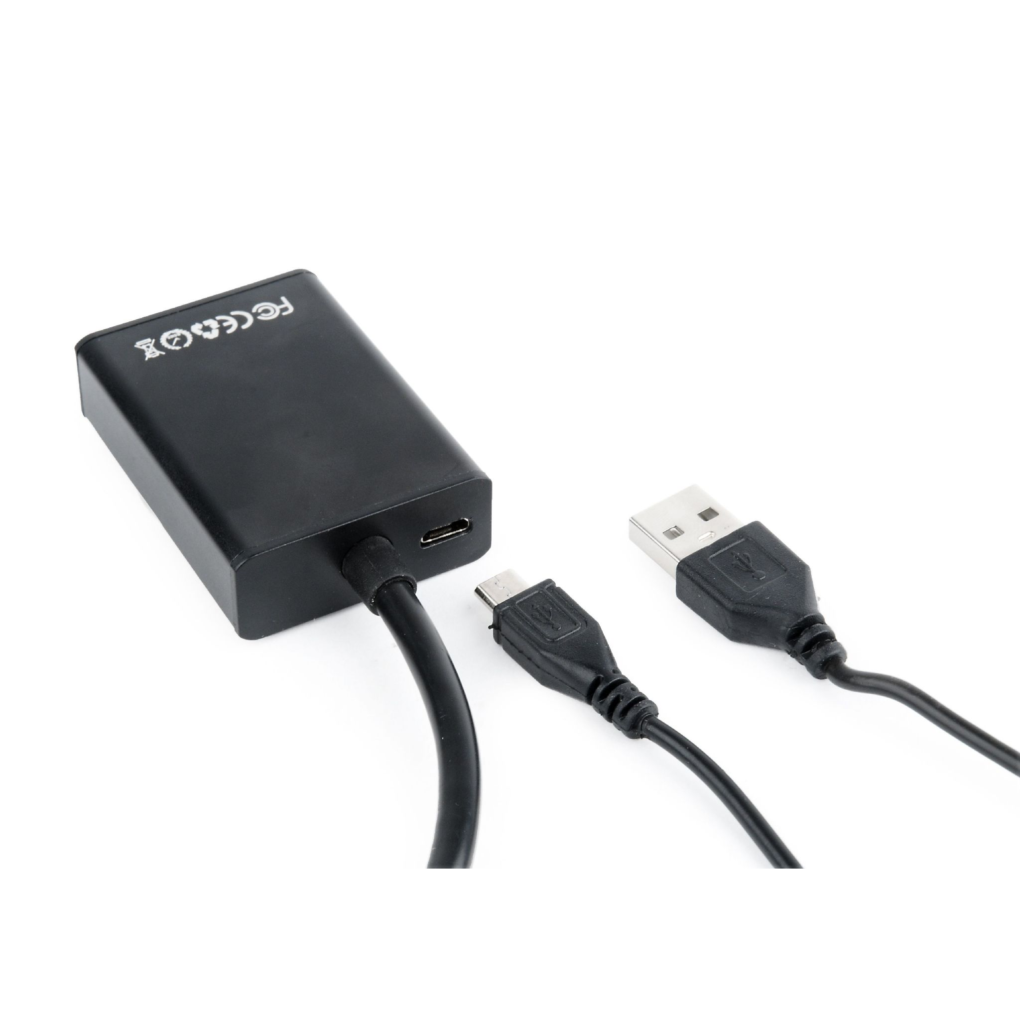Adaptador negro con cables. Incluye un cable USB y micro USB.