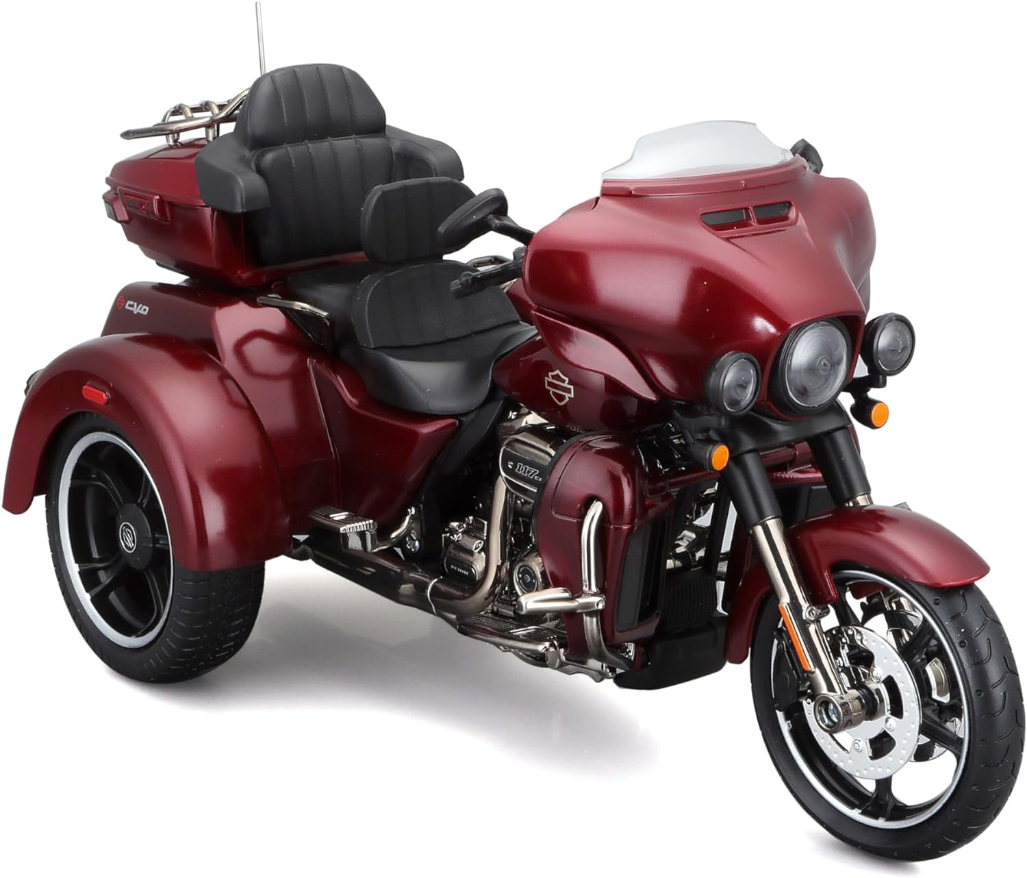 Burgunderrotes Harley-Davidson Trike-Modell. Es hat drei Räder, einen Beifahrersitz und einen Kofferraum.