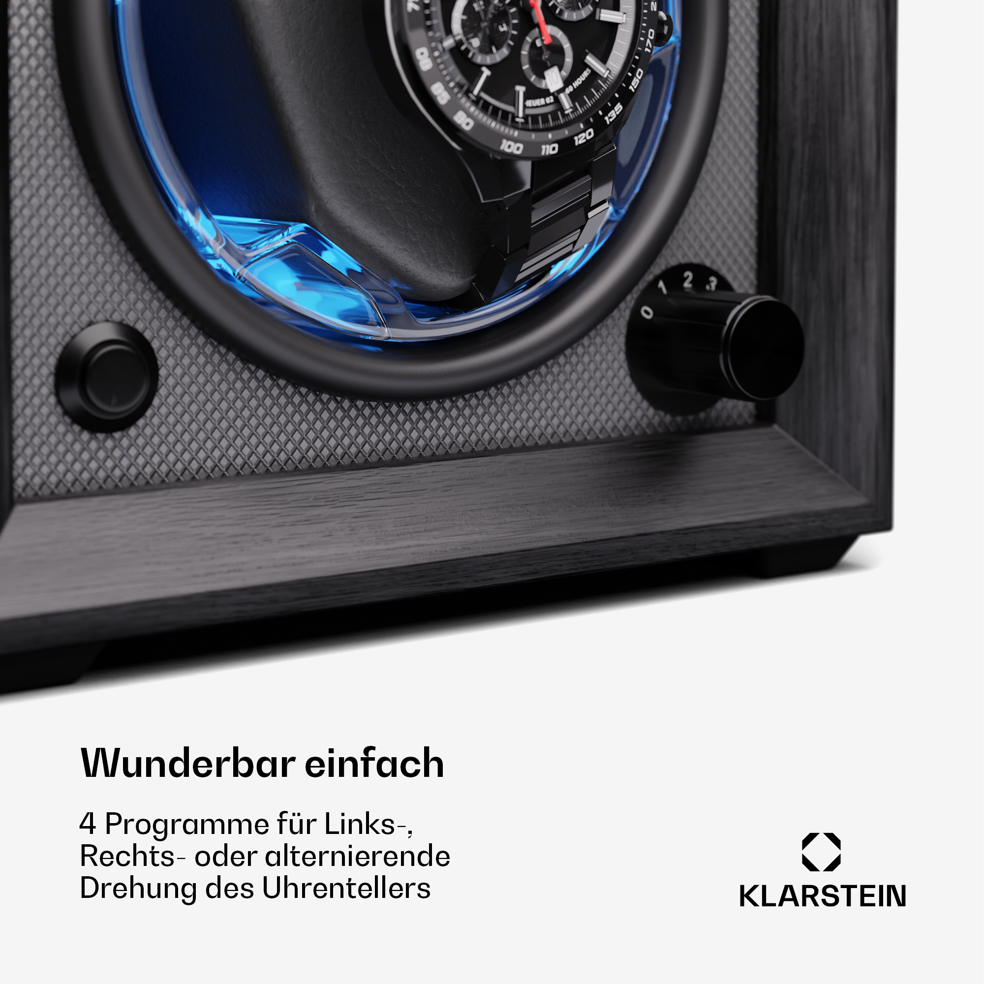 Uhrenbeweger mit Uhr. Schwarze und Holzoberfläche. Bedienelemente und Text sichtbar.