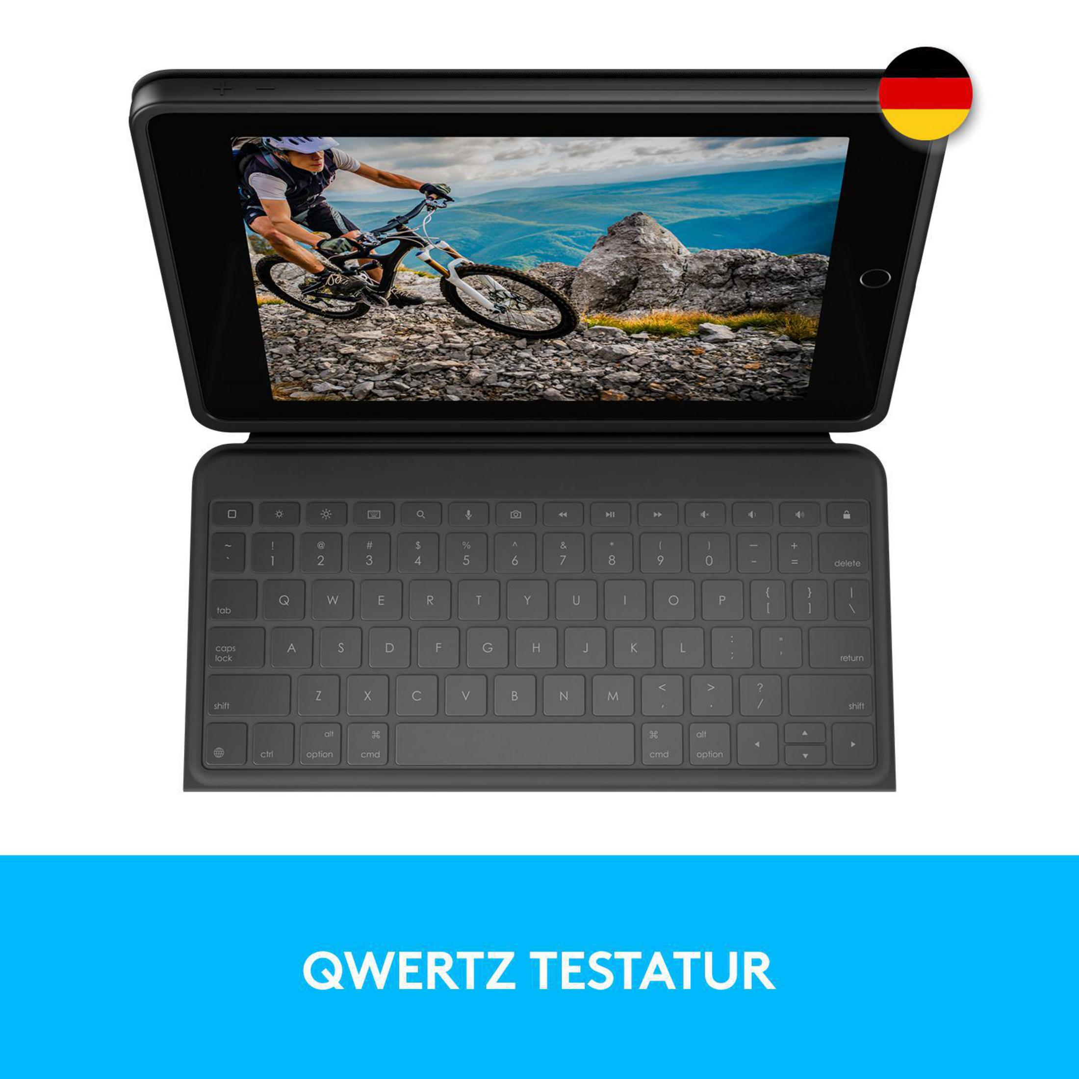 Schwarzes Tablet mit Tastatur. Der Bildschirm zeigt einen Radfahrer auf einem Mountainbike. Deutsches Flaggen-Symbol.