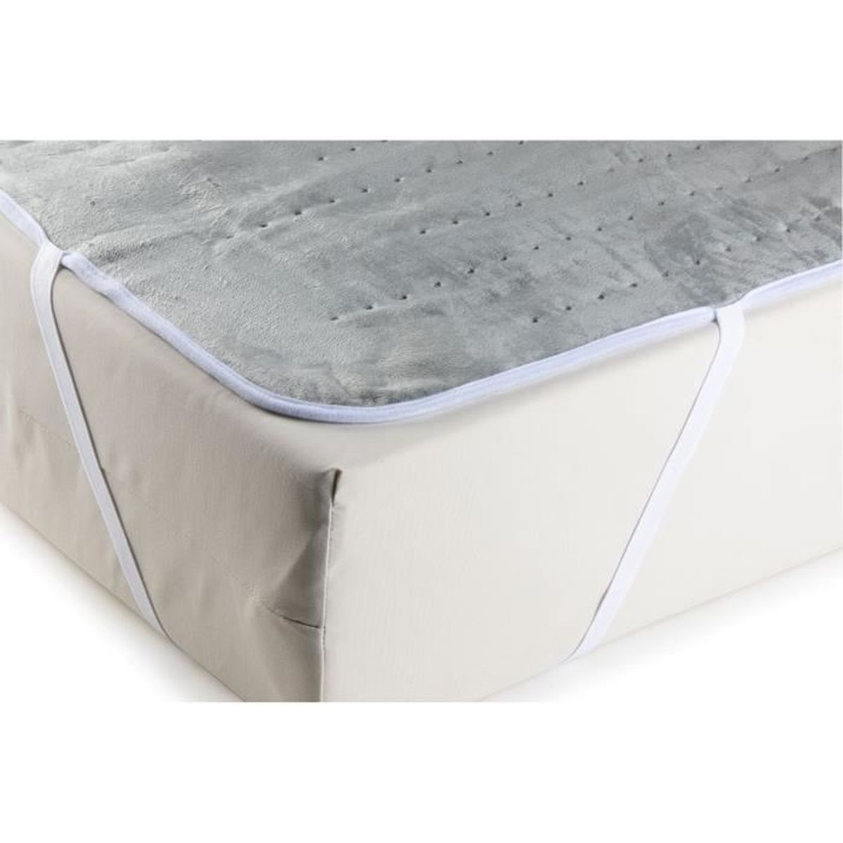 Un coprimaterasso riscaldato grigio su un letto bianco. Cinghie bianche lo fissano.