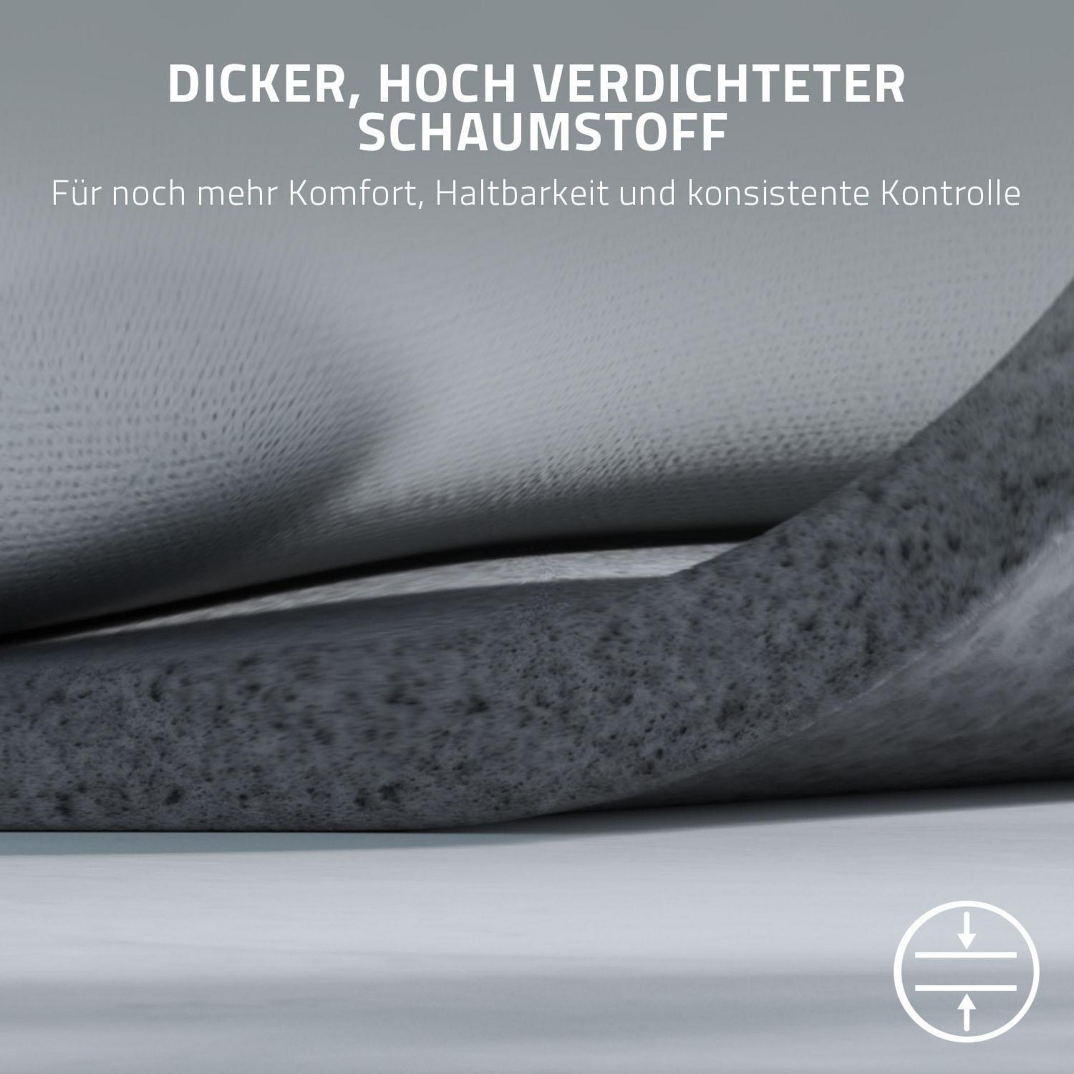 Zbliżenie na szarą piankę materacową z tekstem o komforcie i trwałości.