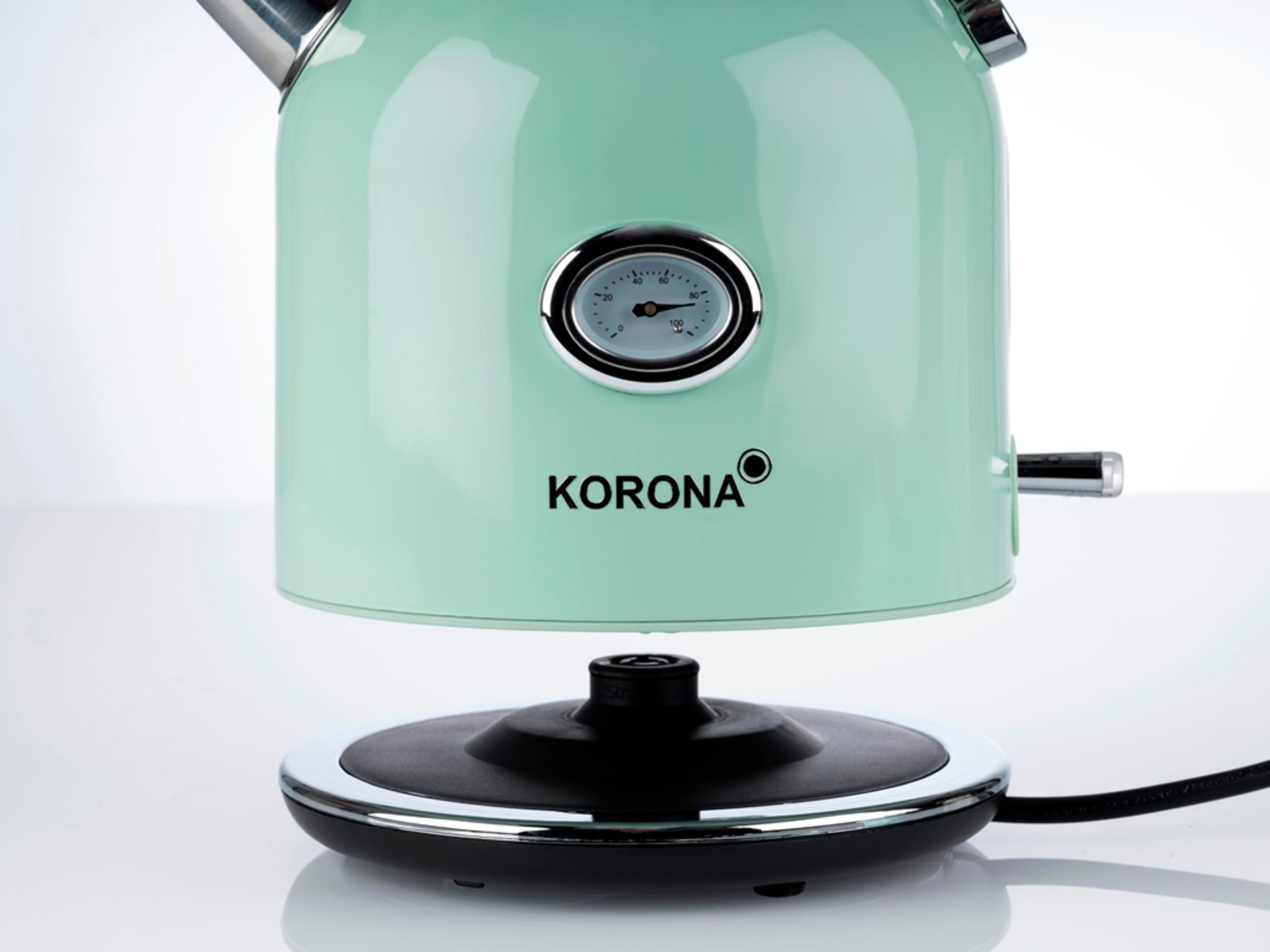 Ein mintgrüner Wasserkocher mit Temperaturanzeige und dem Wort 'KORONA'.