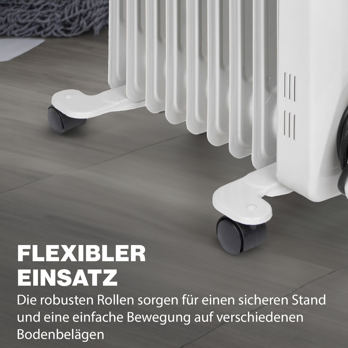 Biały grzejnik olejowy z kółkami. Tekst: FLEXIBLER EINSATZ.