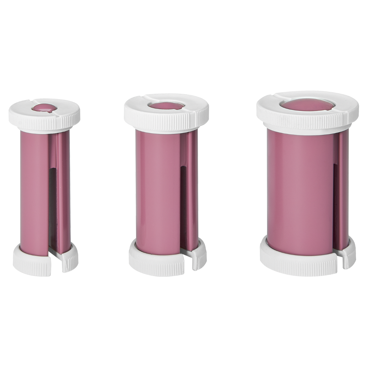 Drei rosa-weiße Kunststoffzylinder. Sie variieren in der Größe und haben einen Schlitz und einen weißen Deckel.