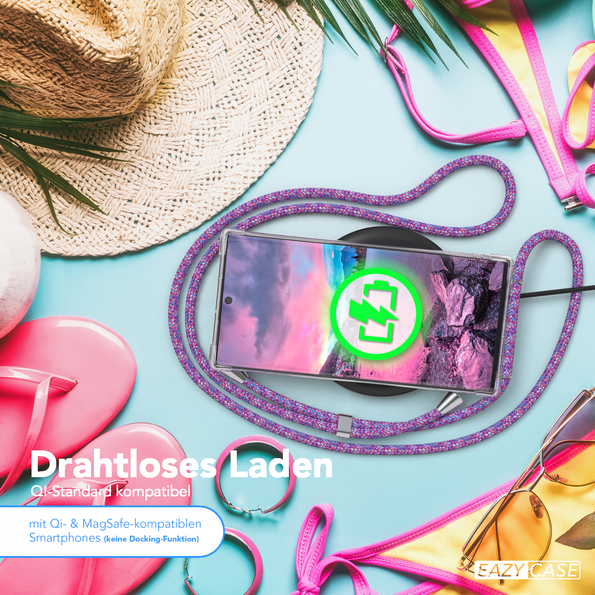 Telefon auf Ladegerät mit Zubehör, rosa und lila Gegenstände auf blauem Grund.