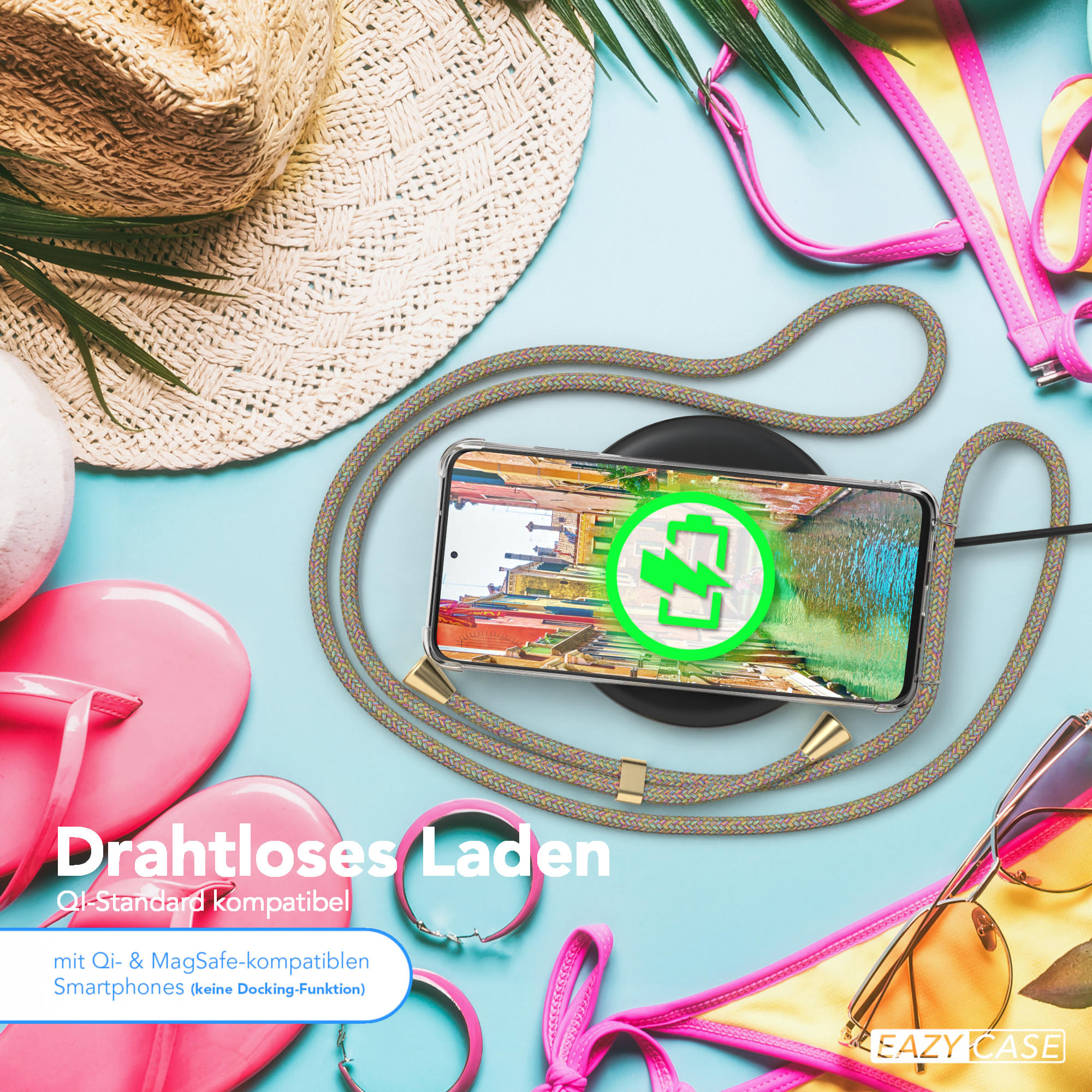Ein Telefon in einer Hülle liegt auf einem kabellosen Ladegerät, mit Sommeraccessoires.
