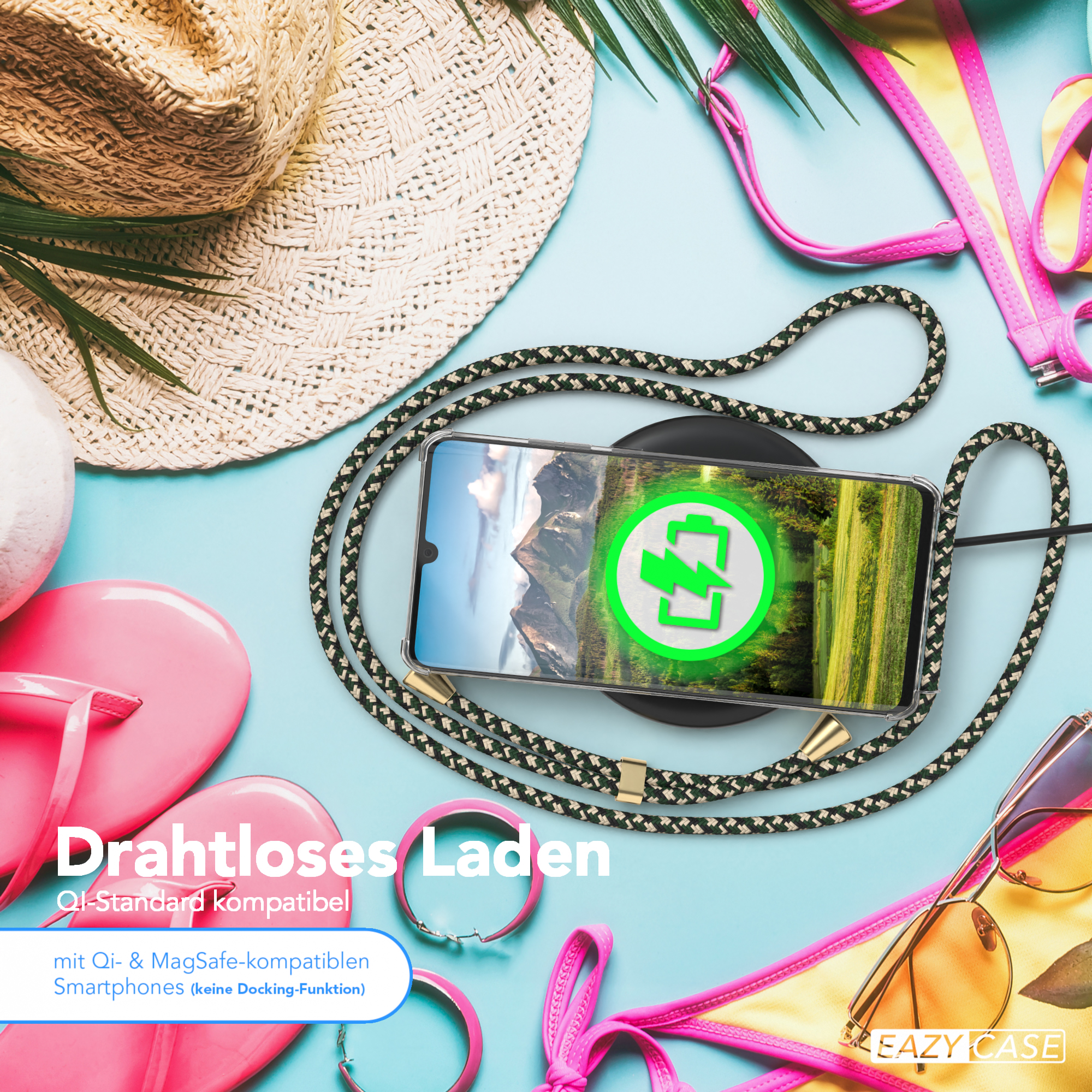 Telefon auf kabellosem Ladegerät, verbunden mit einem schwarz-grün-goldenen Lanyard, mit Strandartikeln. Qi-Standard kompatibel.