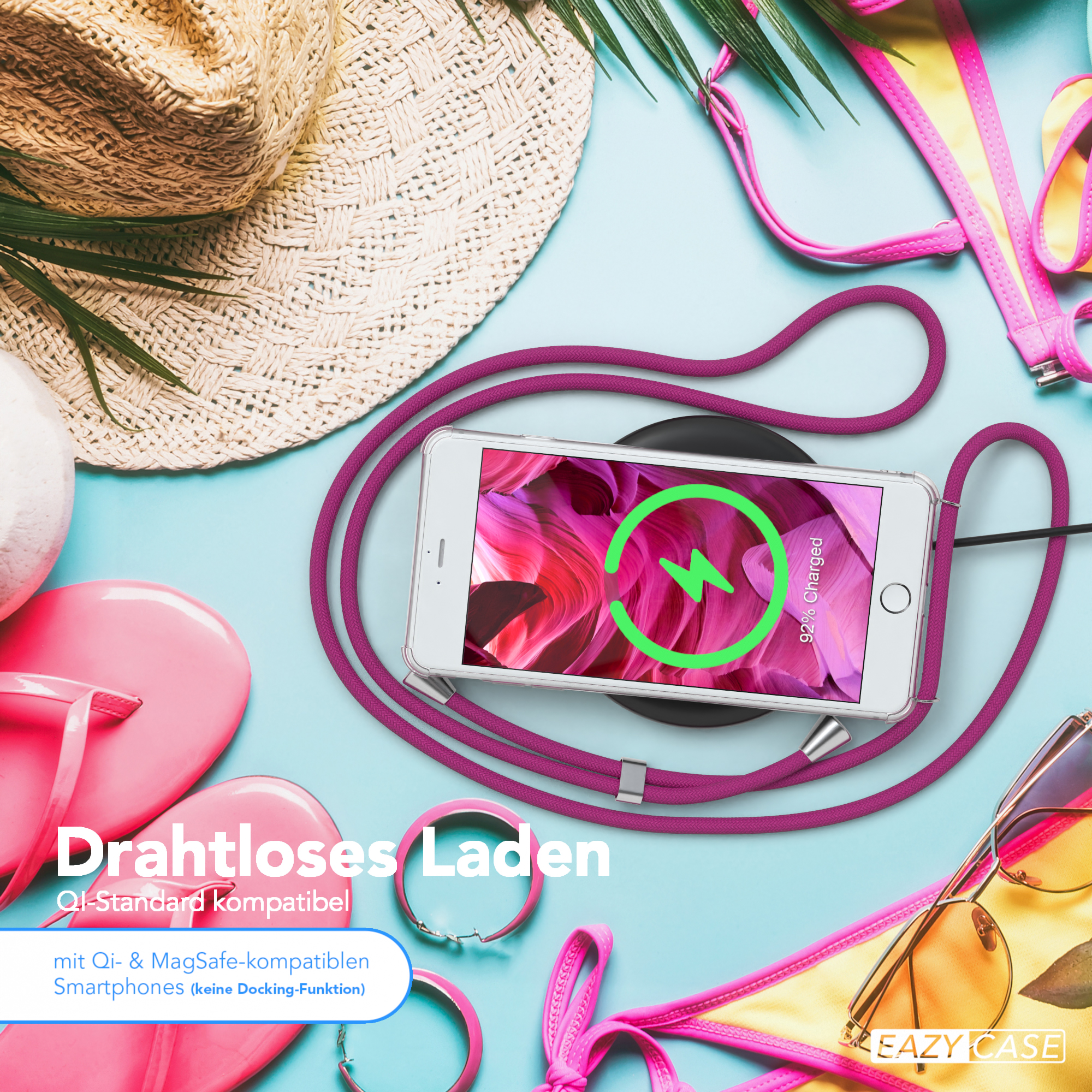 Telefon drahtlos geladen, mit Zubehör und Text über kabelloses Laden.