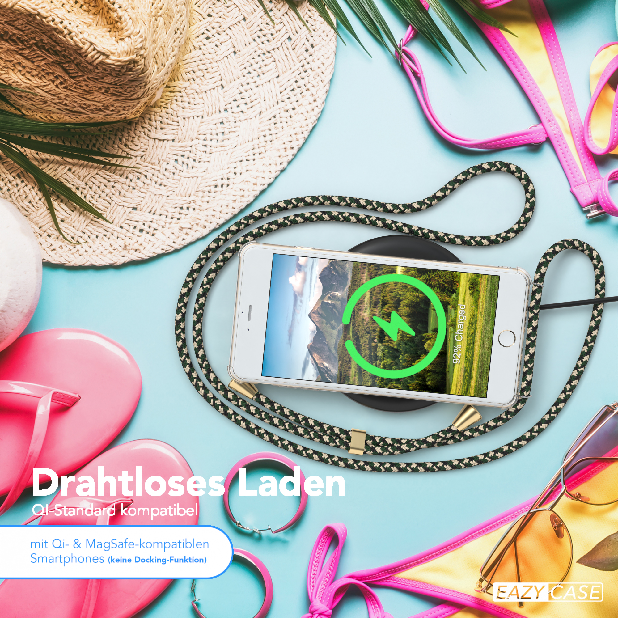 Blauer Hintergrund mit Strandaccessoires und drahtlos ladendem Telefon.