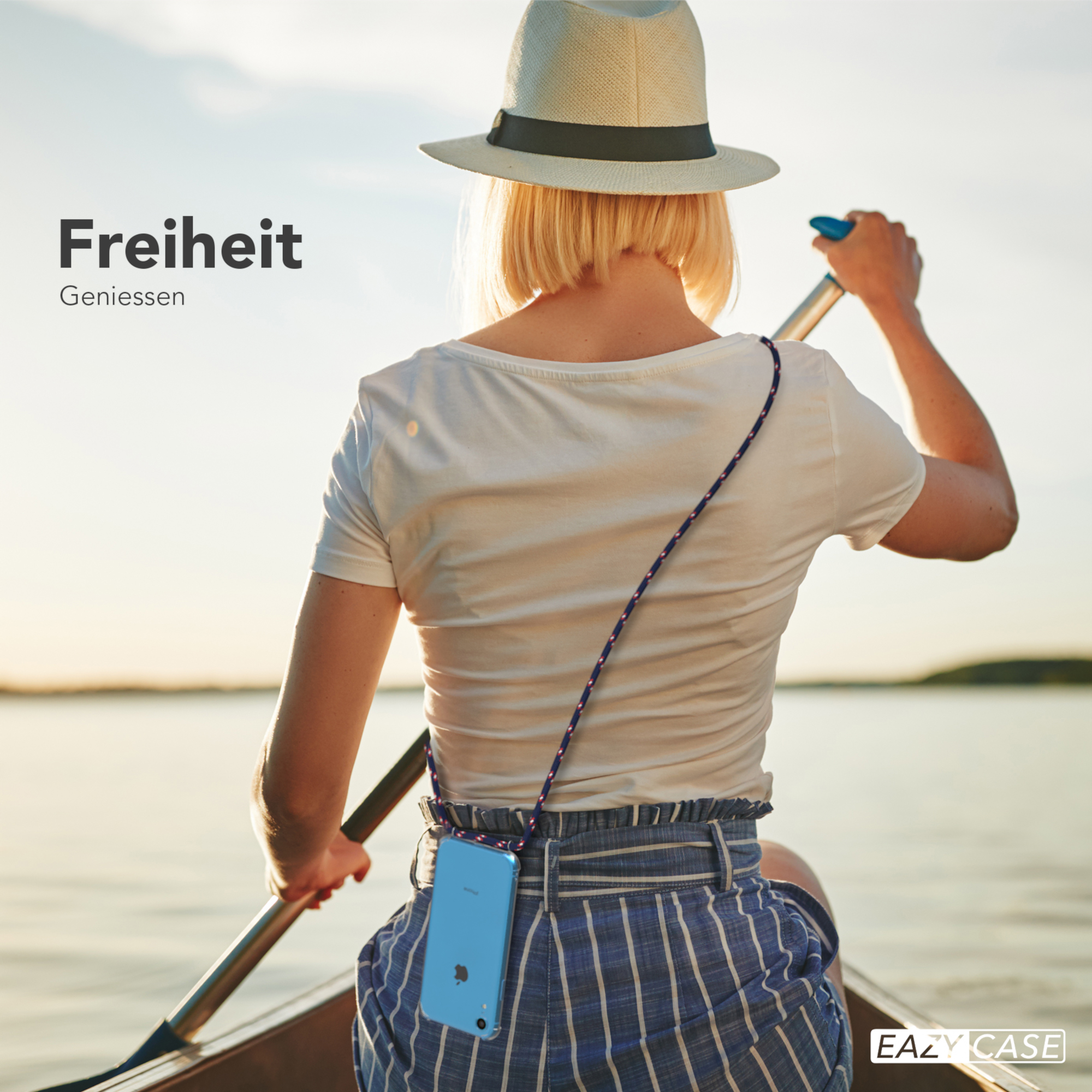 Frau paddelt ein Kanu, Telefon an einem Lanyard. Text: Freiheit, Geniessen, EAZY CASE Logo.