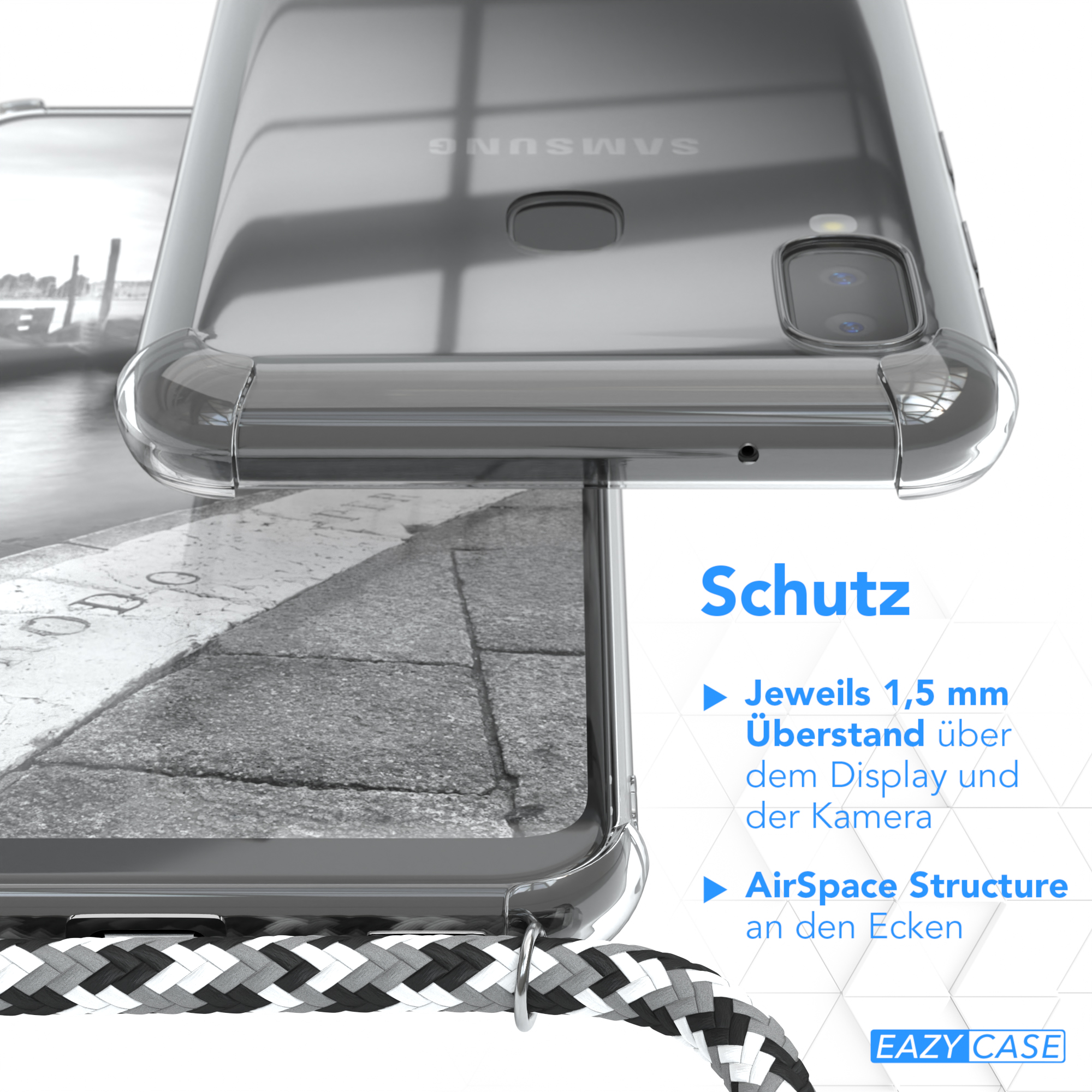Nahaufnahme einer Handyhülle. Sie ist klar und hat eine schwarz-weiße Schnur befestigt.
