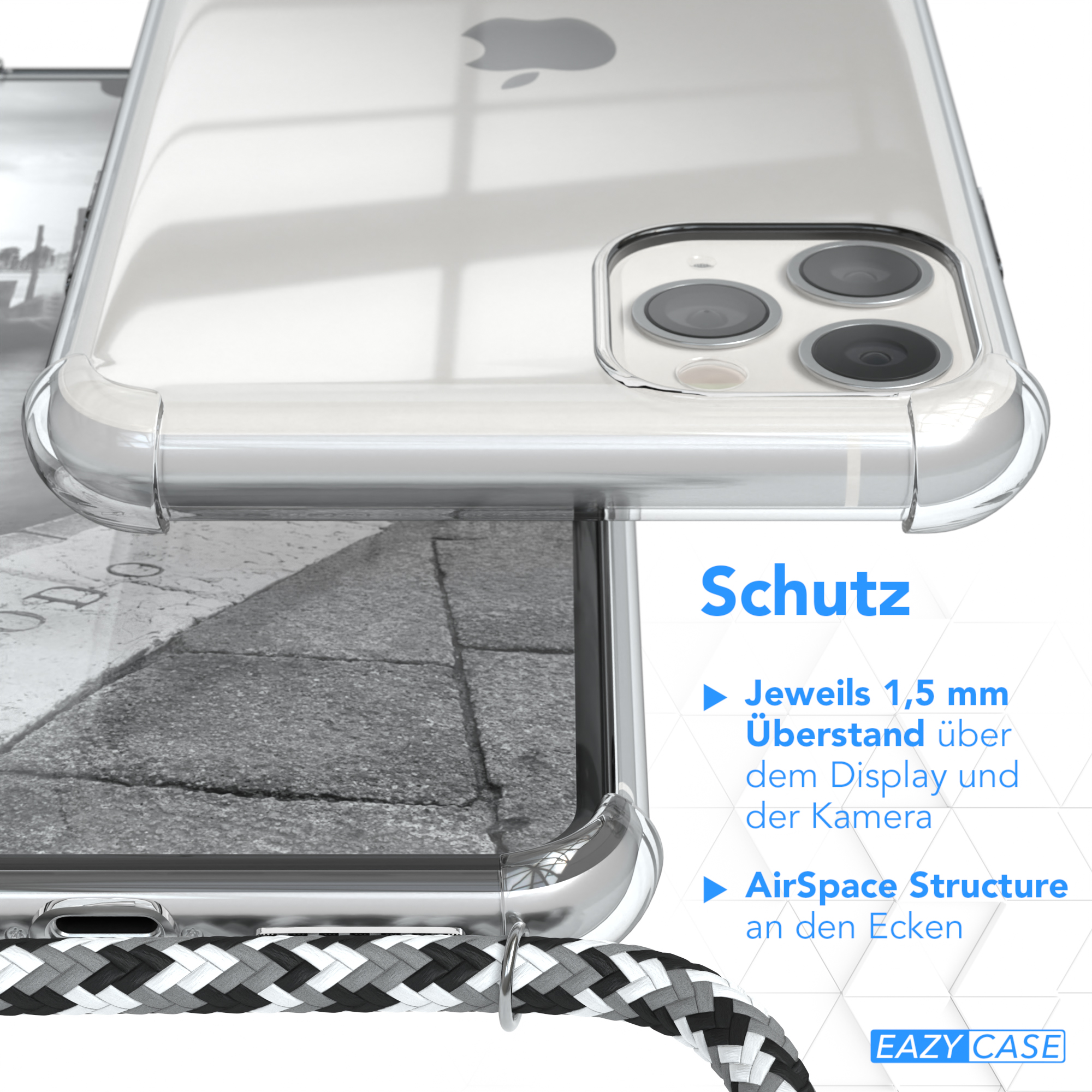 Nahaufnahme einer Handyhülle. Text sagt Schutz. Schwarz-weißes Kabel. Verschwommener Hintergrund.