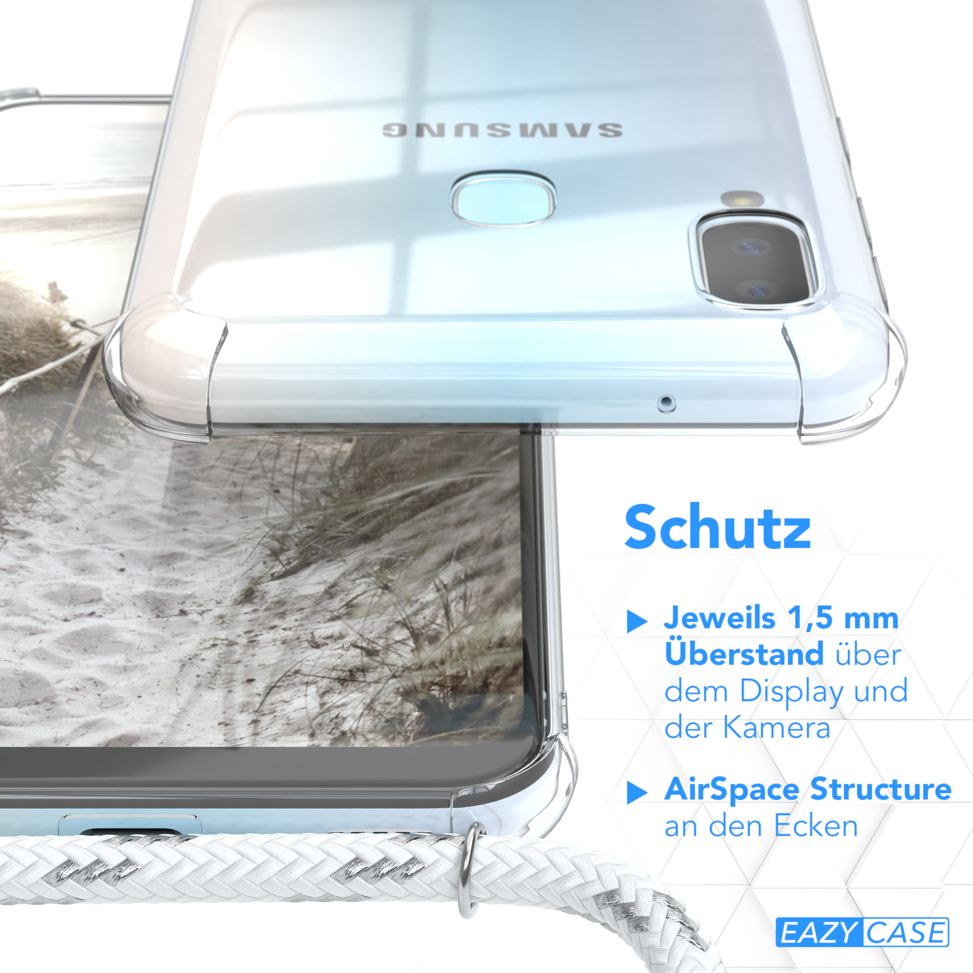 Nahaufnahme einer Handyhülle mit sandigem Hintergrund. Die Hülle hat einen weißen Riemen.