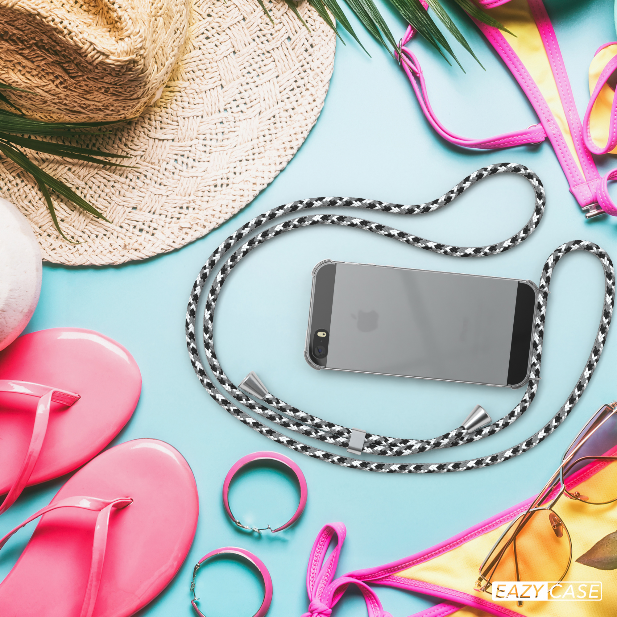 Telefon mit Trageriemen, Sonnenbrille, Bikini und Hut auf blauem Untergrund. Text: Drahtloses Laden, Qi-Standard kompatibel.
