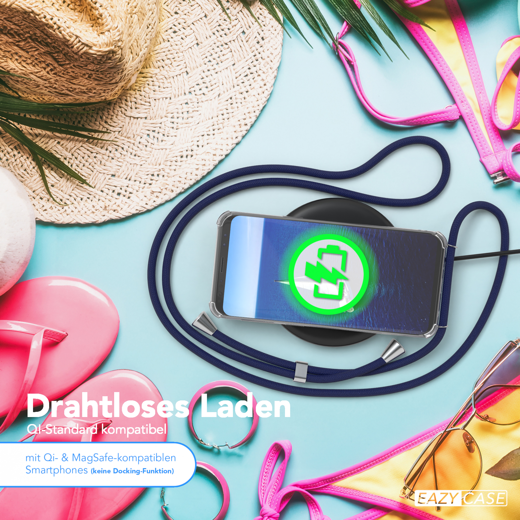 Telefon auf kabellosem Ladegerät, Strandaccessoires, die kabelloses Laden suggerieren.