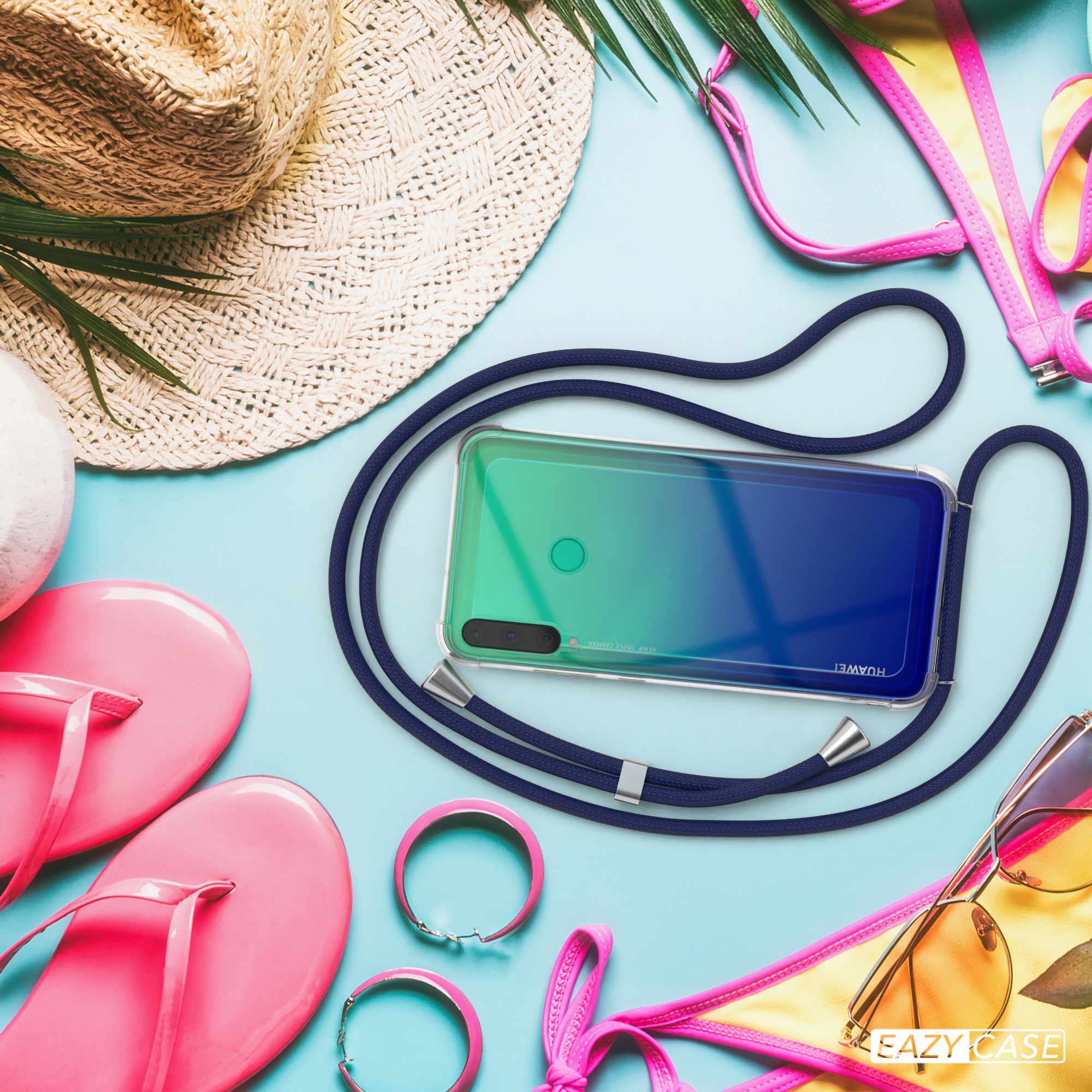 Handyhülle mit Lanyard und Strandzubehör. Enthält Strohhut, Sonnenbrille und rosa Accessoires.