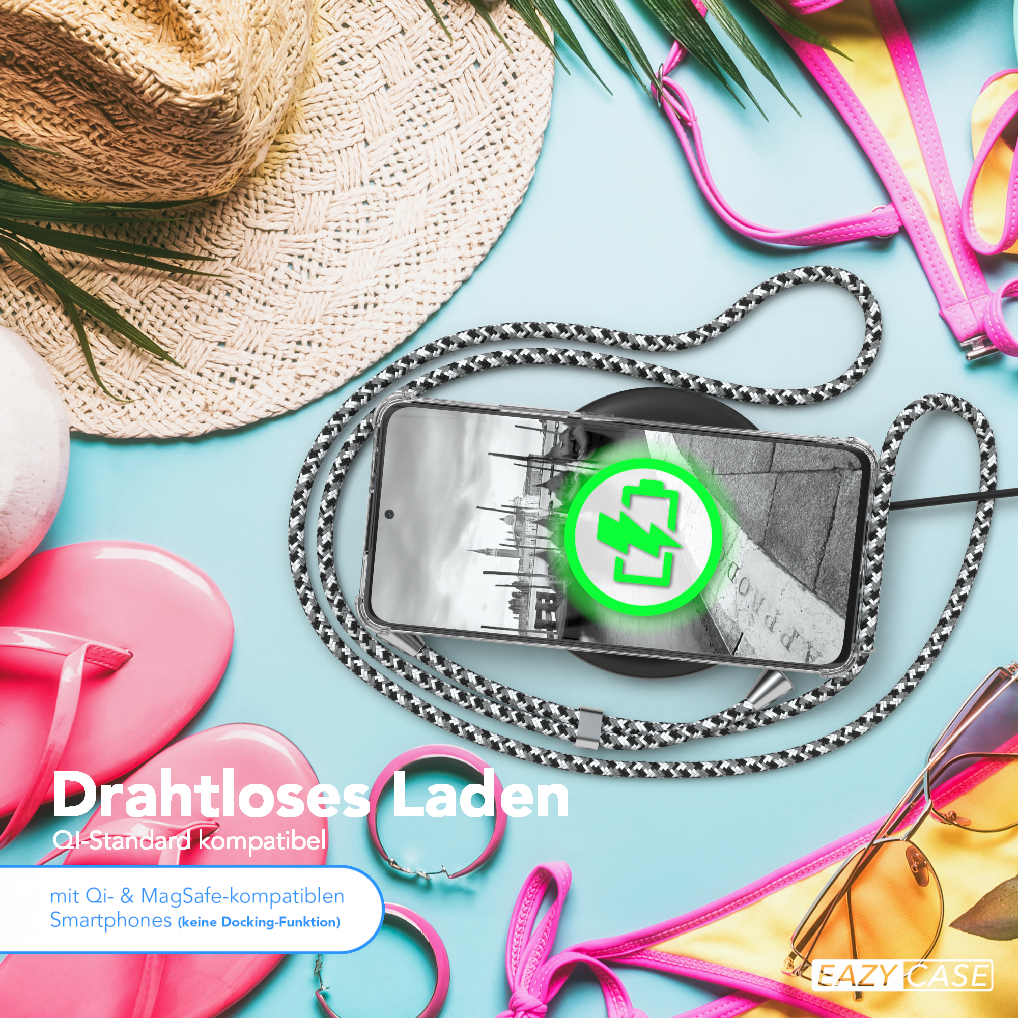 Telefon lädt drahtlos, Strandaccessoires, deutscher Text.