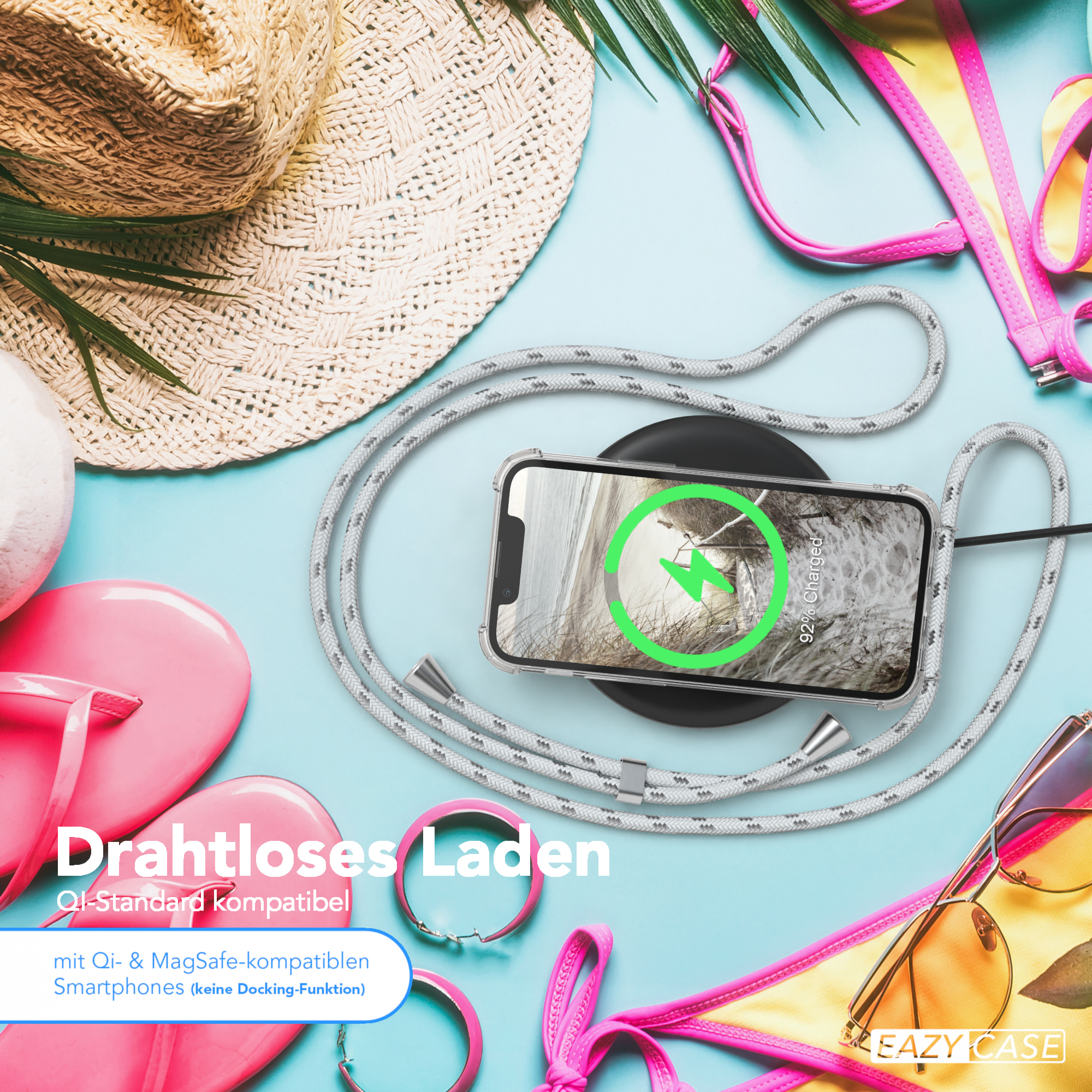 Telefon kabellos auf einem Pad laden, Strandaccessoires, Text 'Drahtloses Laden'.