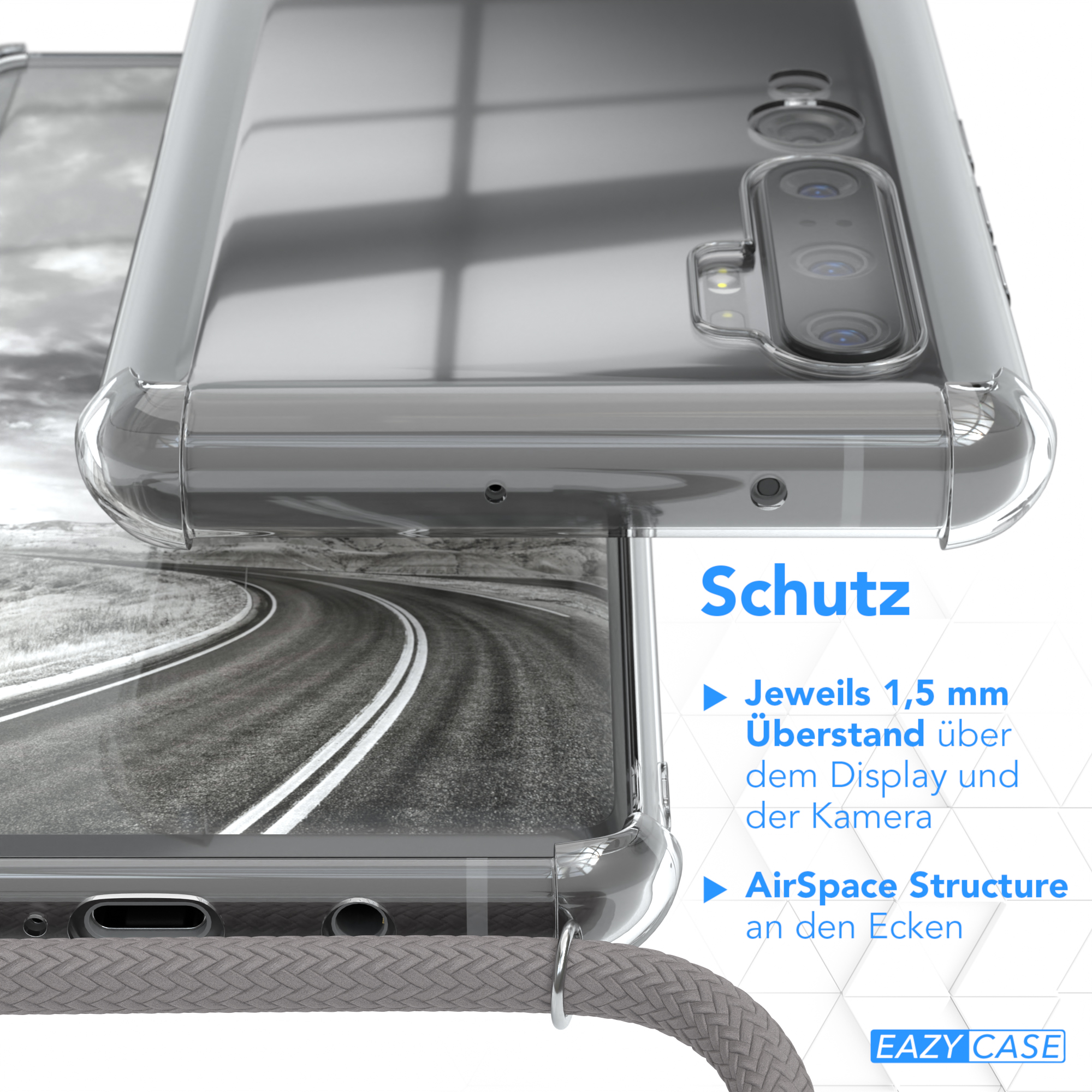 Transparente Handyhülle vor Straßenhintergrund. Graue Kordel befestigt.