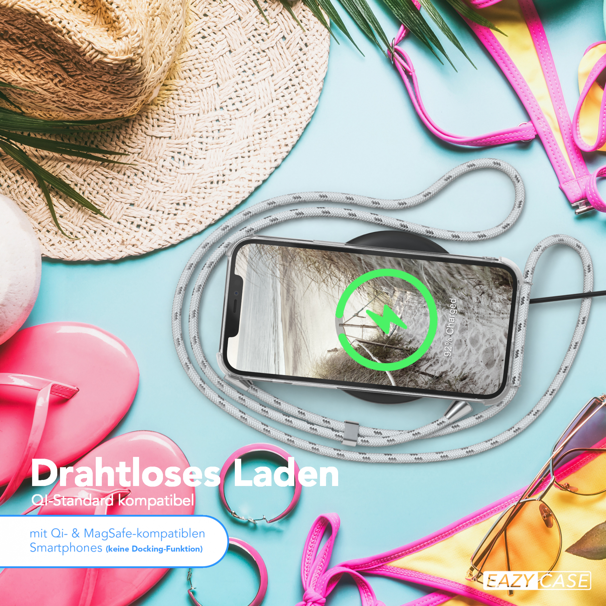 Telefon in einer transparenten Hülle auf einem Ladegerät mit Zubehör. Produkttext ist sichtbar.