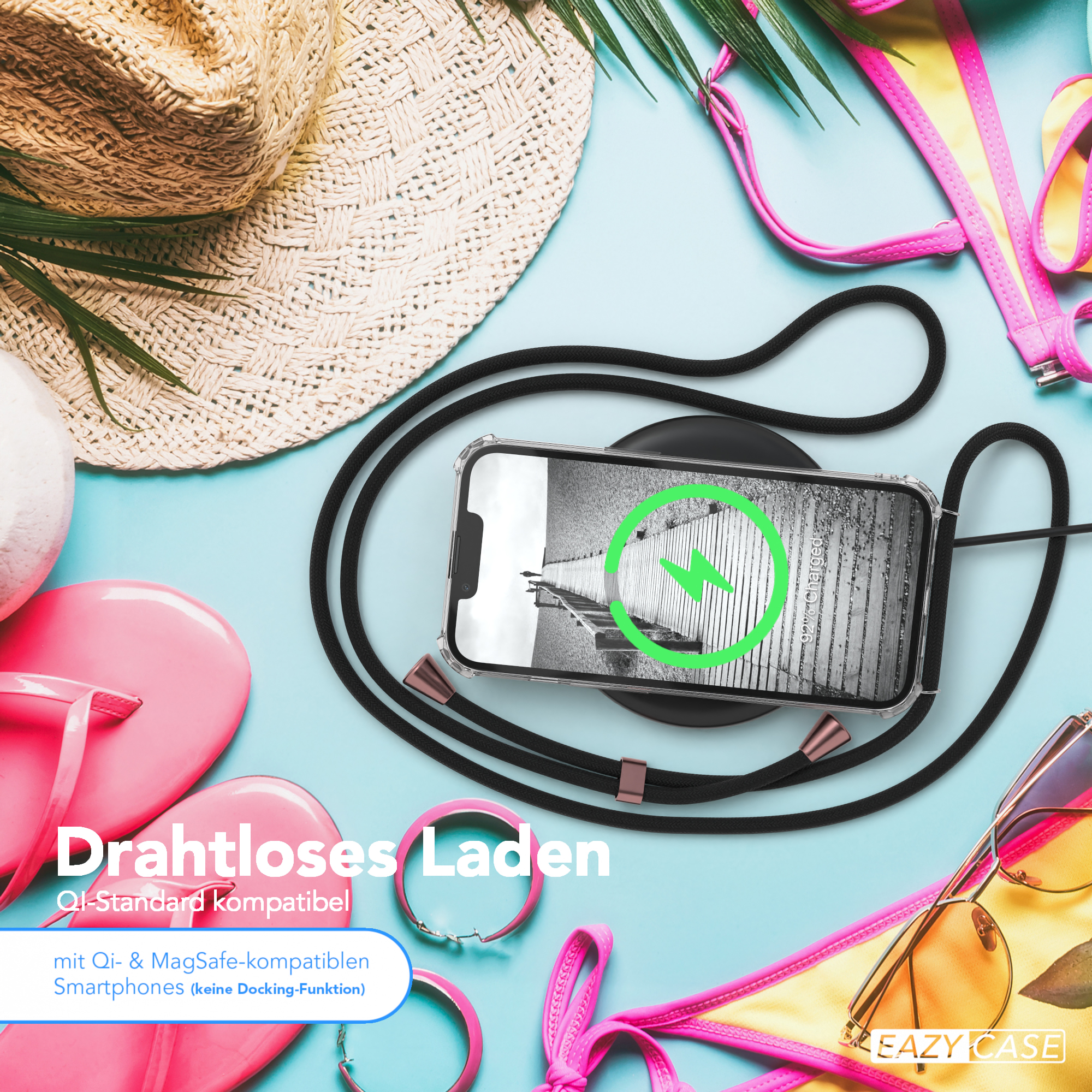 Telefon auf Ladegerät, Strandartikel: Hut, Bikini, Sonnenbrille, rosa Flip-Flops und Armband.
