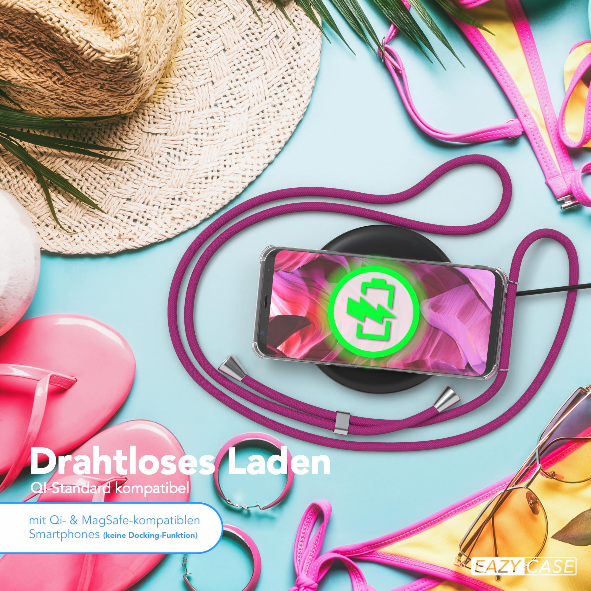 Ein Telefon wird kabellos geladen. Strandutensilien sind im Bild. Rosa, gelbe und blaue Farben.