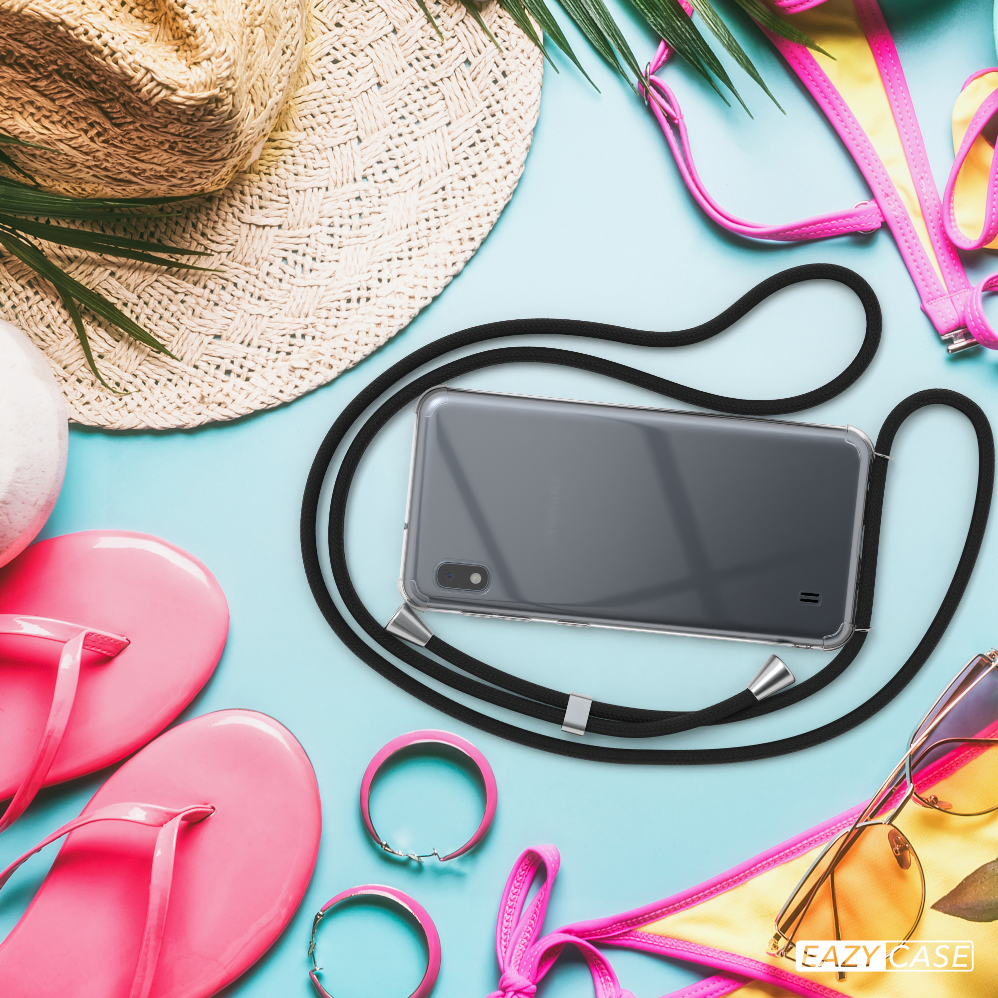 Ein Telefon mit schwarzem Band, Strandartikel auf blauem Grund, Hut, Sandalen, Bikini.