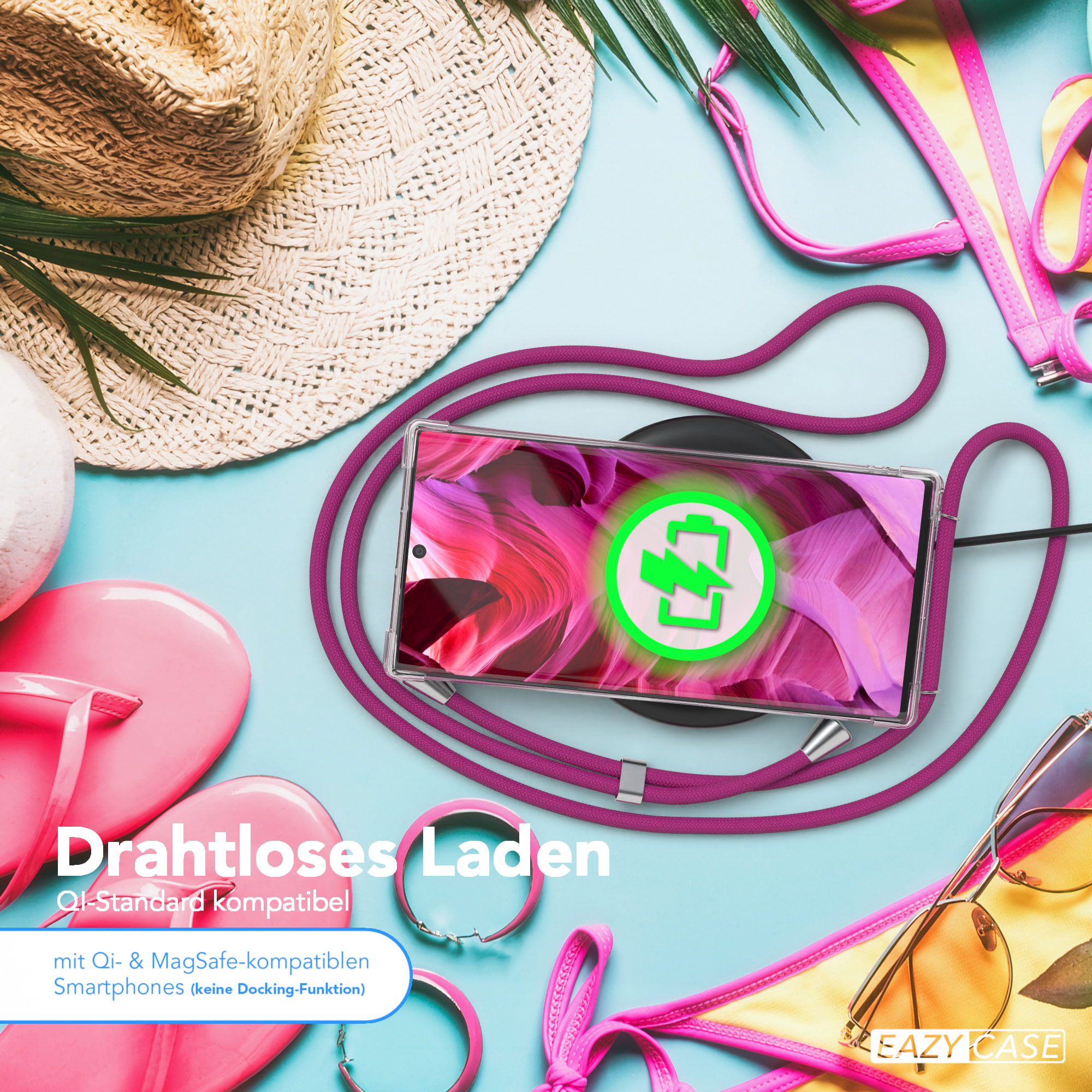 Telefon auf einem kabellosen Ladegerät, umgeben von Strandaccessoires, mit einer lila Schnur.