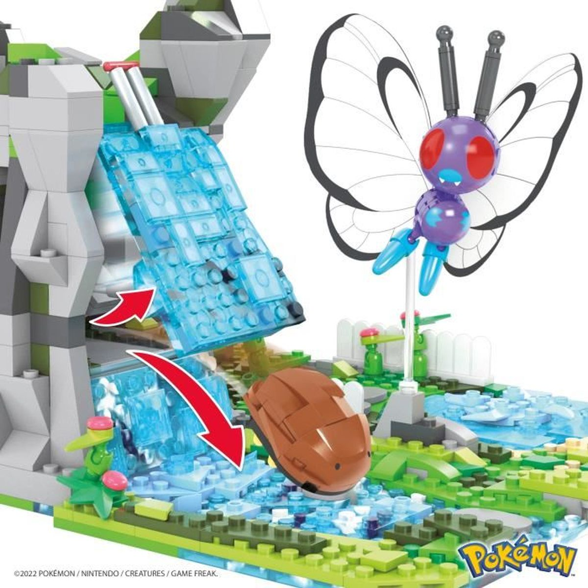 Lego-Szene mit Schmetterling, Wasserfall und anderen Strukturen. Braunes Objekt fällt.