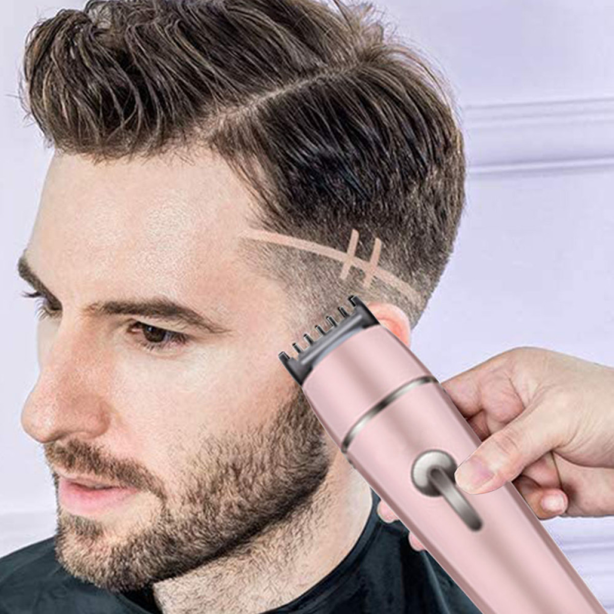 Das Haar eines Mannes wird mit einem rosafarbenen Trimmer geschnitten. Das Haar hat ein Design.