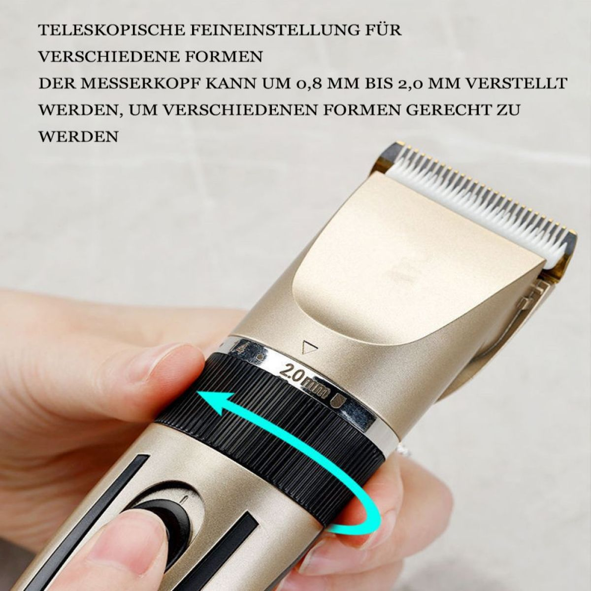Ein goldener Haarschneider mit einem Drehknopf zur Einstellung der Klingenlänge.