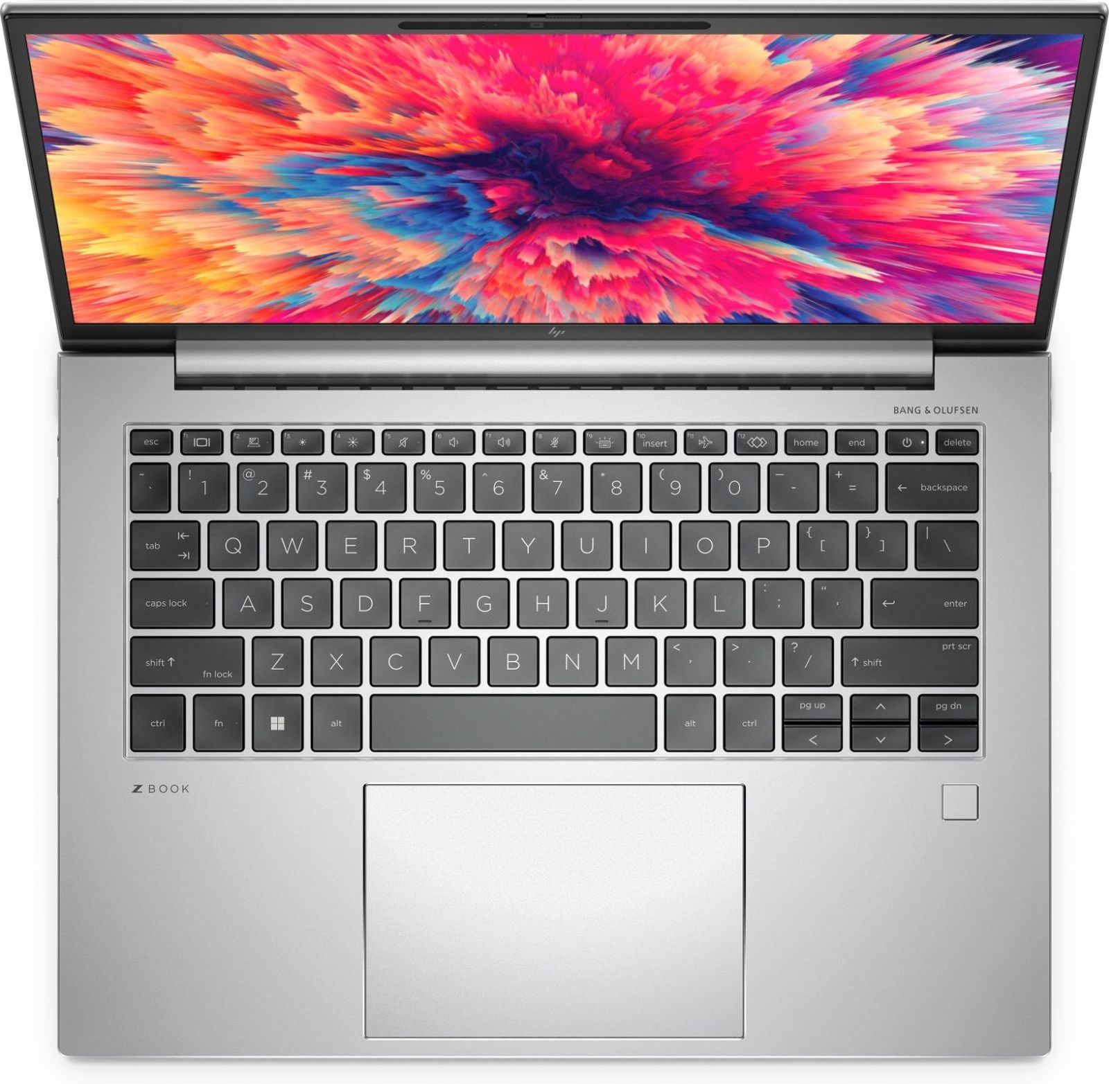 Laptop aperto, tastiera visibile, design astratto colorato visualizzato sullo schermo.
