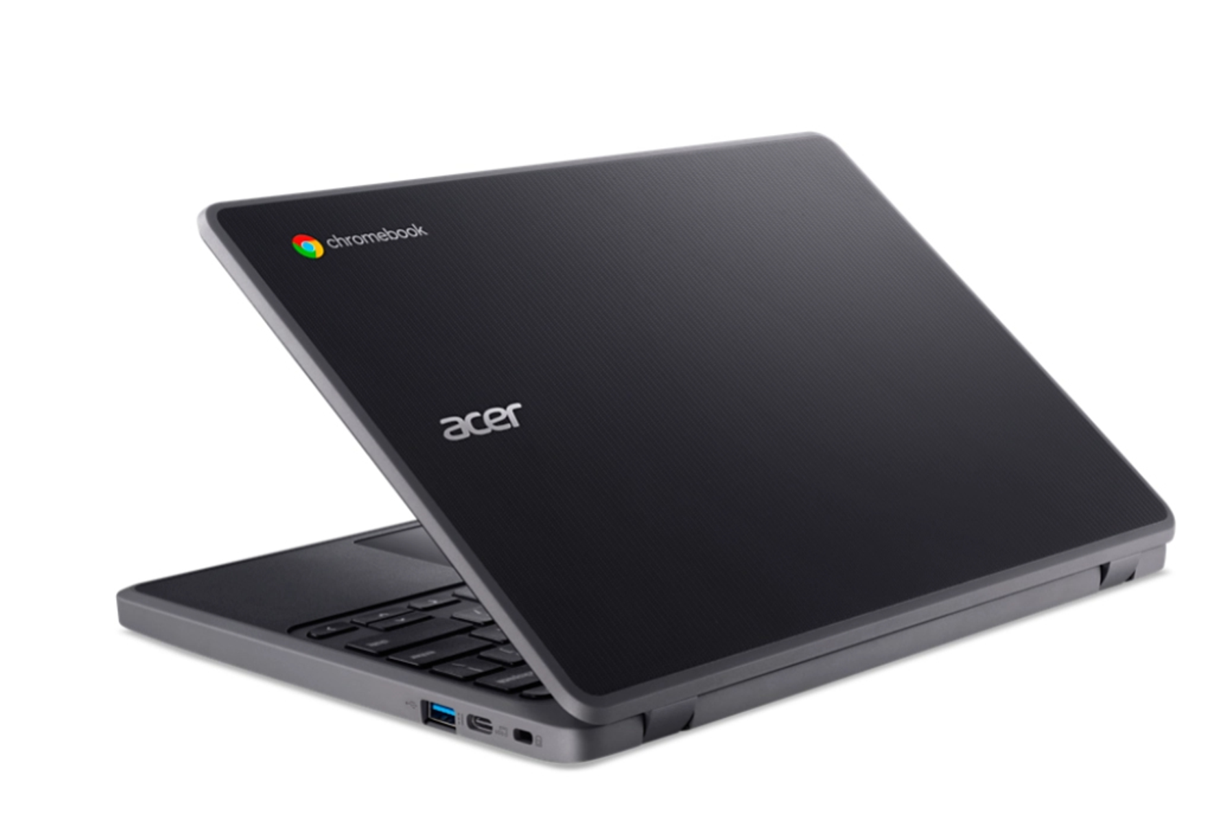 Un laptop Acer Chromebook nero è aperto su una superficie bianca, mostrando la tastiera e lo schermo.