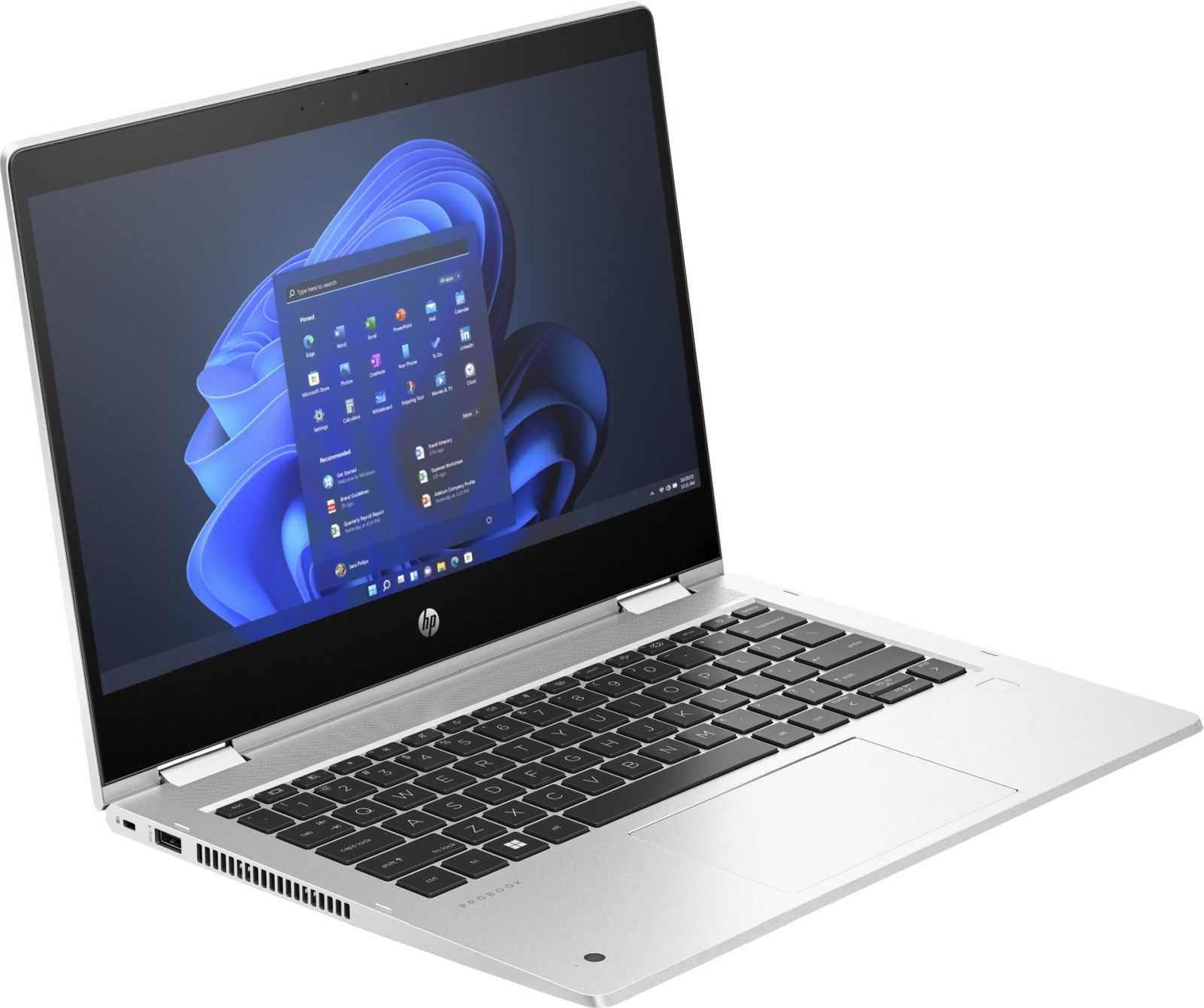 Ein silberner Laptop auf einem Schreibtisch, der einen Desktop mit App-Symbolen zeigt, Perspektivaufnahme.