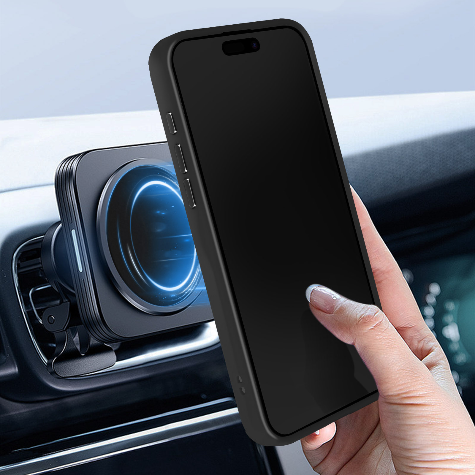 Telefono nero in supporto per auto, tenuto in mano.